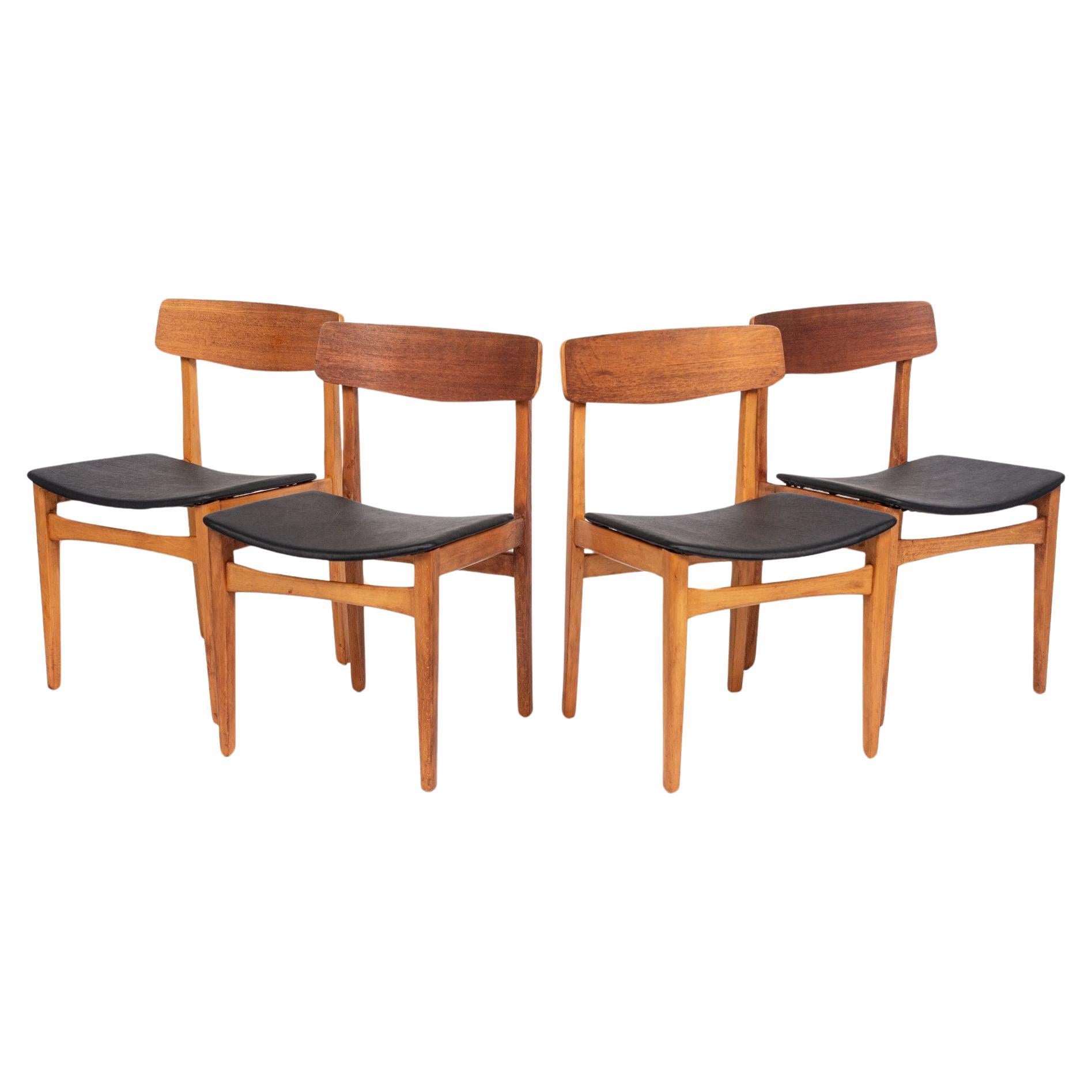 Mid Century Danish Teak Wood & Black Vinyl Dining Chairs For Sale