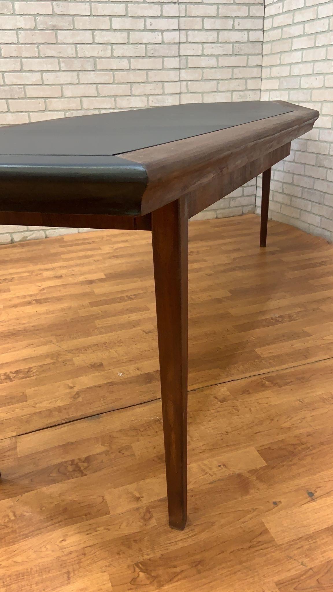 Midcentury Danish Walnut Narrow Boat Shaped Table with Black Laminate Inlay In Good Condition For Sale In Chicago, IL