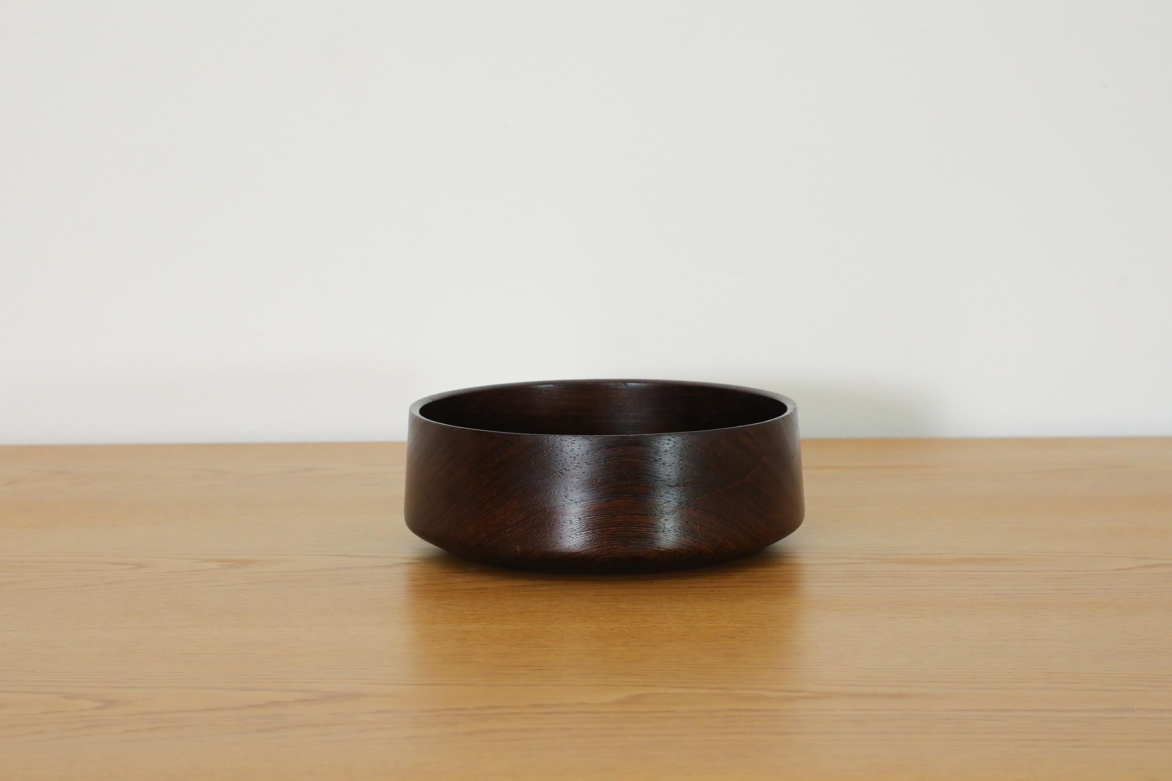 Mid-Century Danish salad bowl made from beautiful solid wenge. In original condition with visible wear consistent with its age and use.