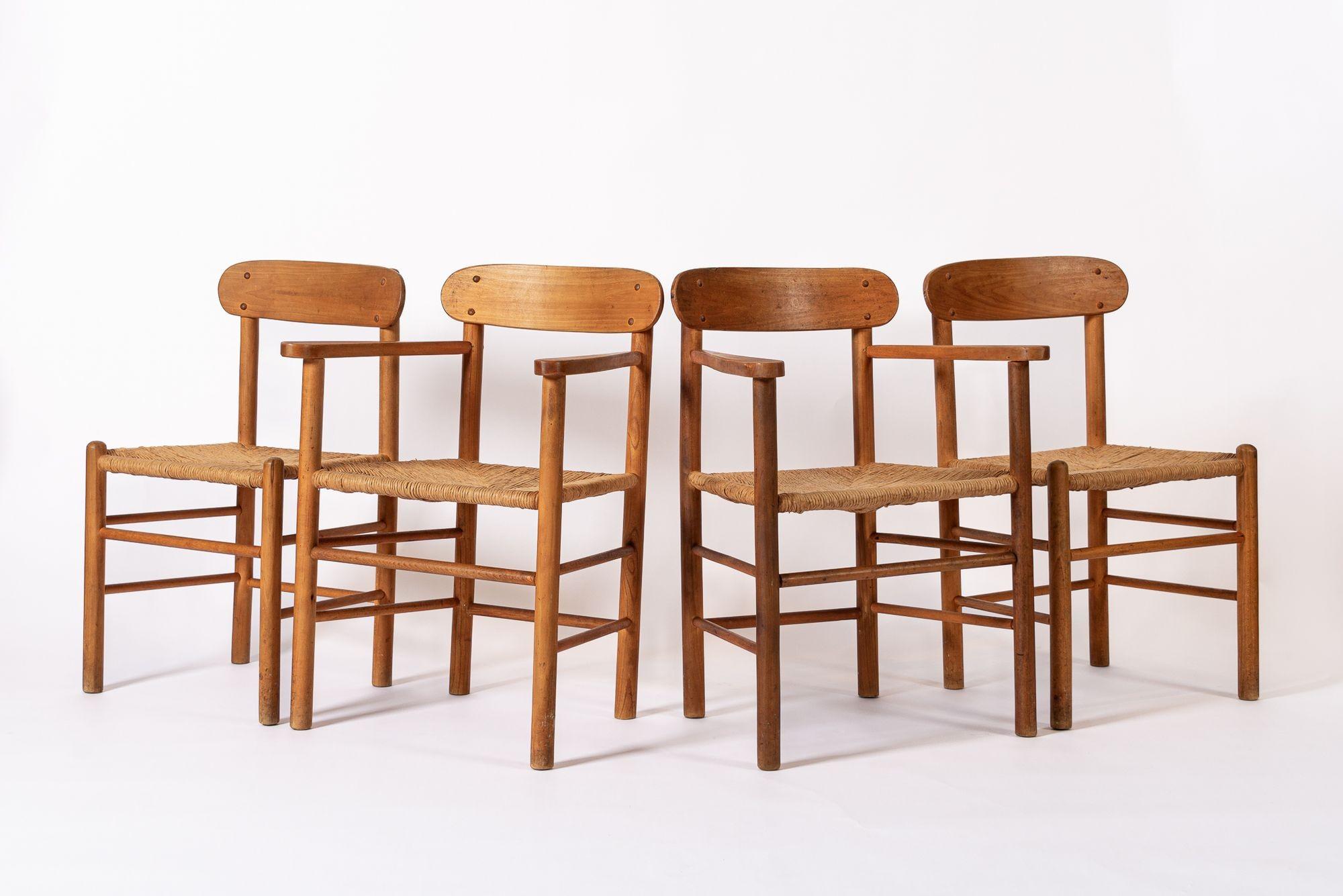 Sillas de comedor danesas de madera y mimbre de mediados de siglo Moderno de mediados de siglo en venta