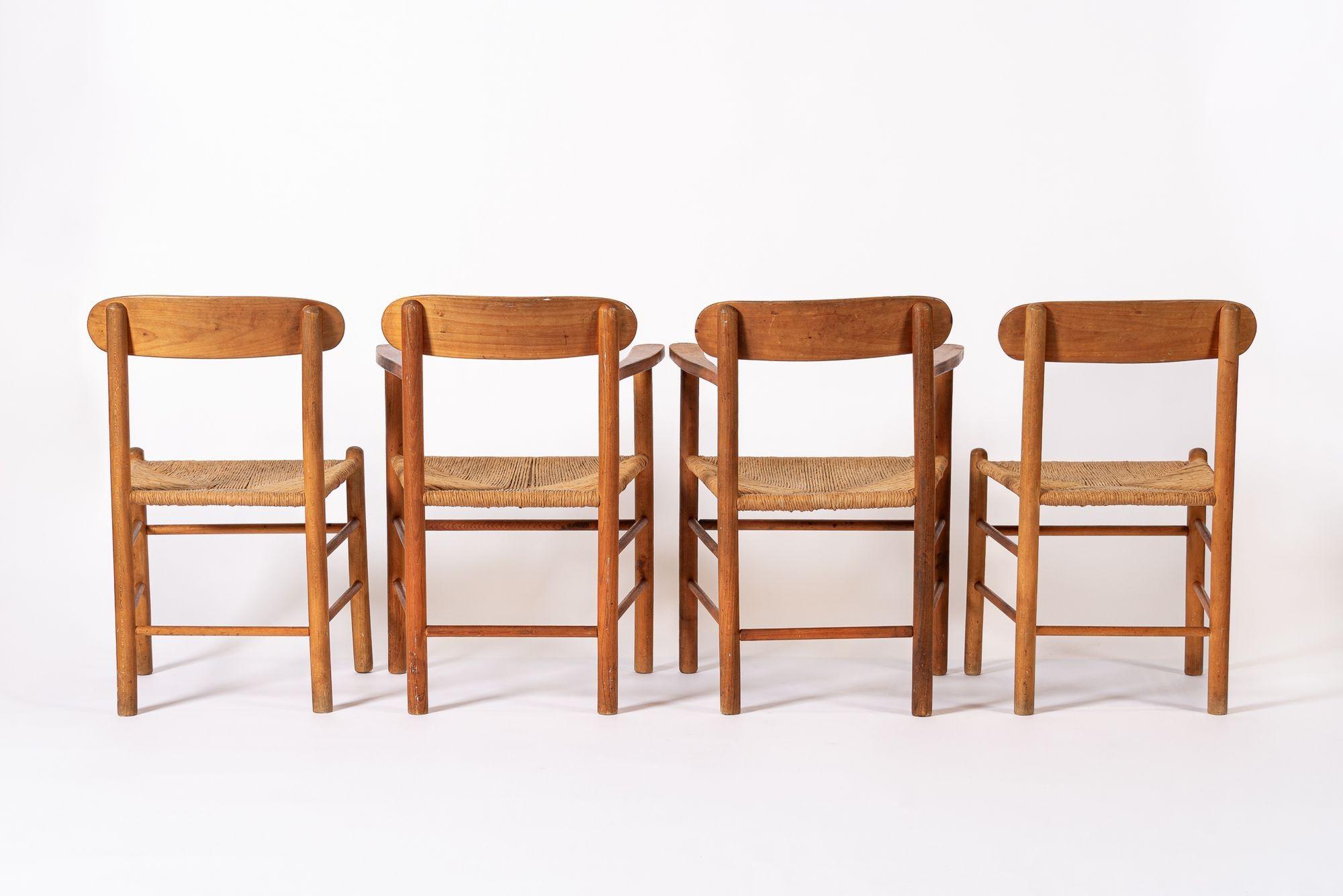 Sillas de comedor danesas de madera y mimbre de mediados de siglo mediados del siglo XX en venta