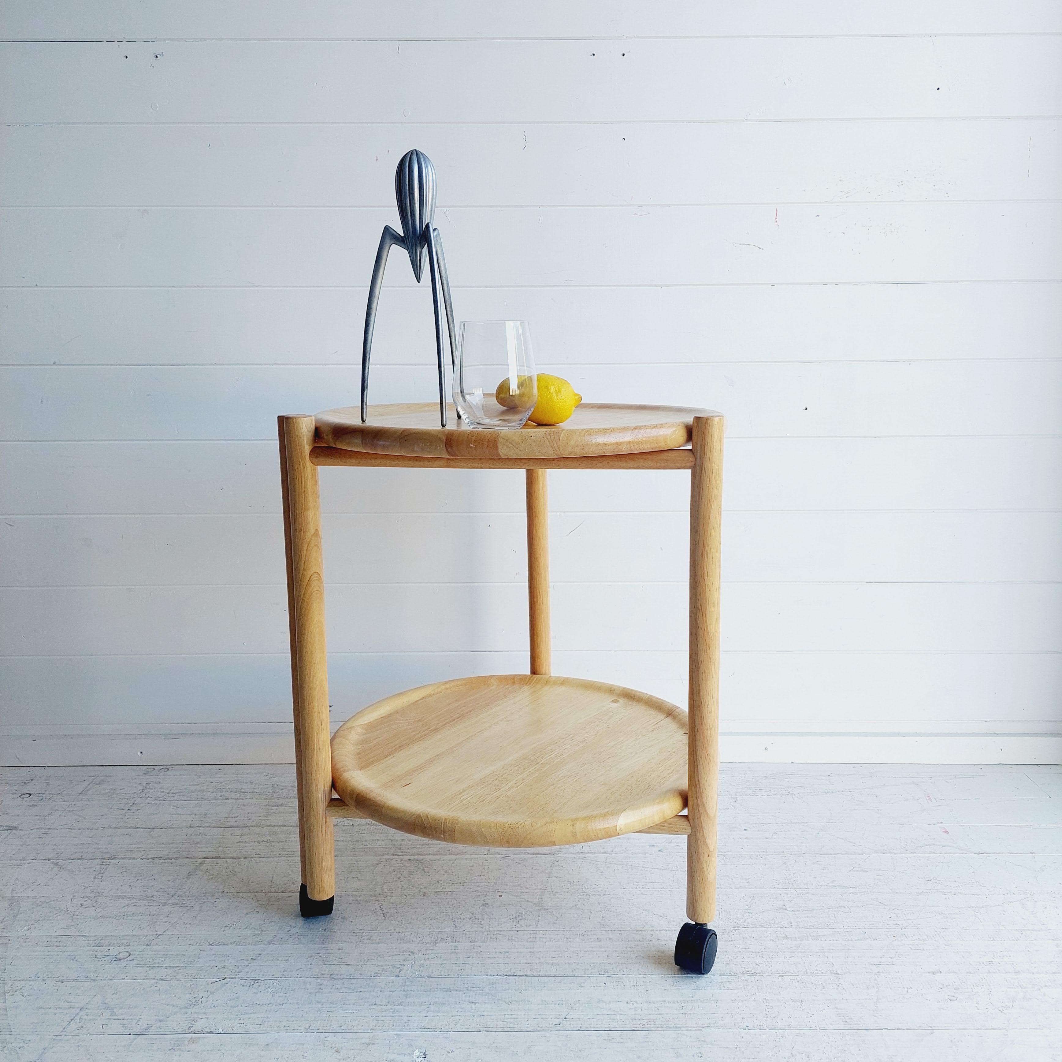 Wooden Lazy Susan trolley foldable

A great piece of Danish furniture that is stylish, practical and functional.
This a trolley made from Beech Wood complete with wheels.
This is ideal for entertaining, what makes it extra special is that it is also