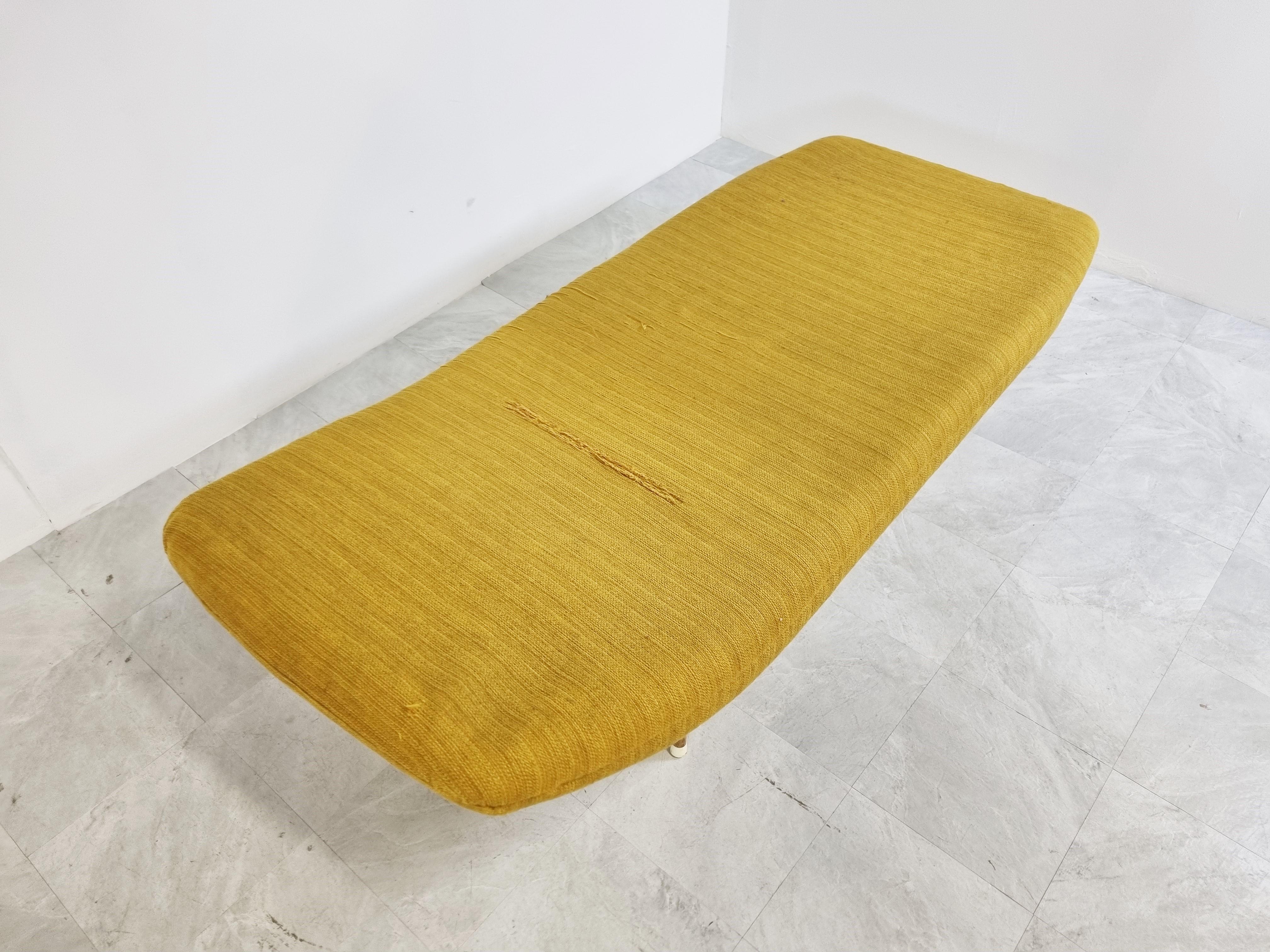 Mid century daybed in the style of Theo Ruth.

Beautiful yellow upholstery, still the original one.

Elegant mid century piece.

Good original condition. 

1960s - Netherlands

Dimensions:
Height: 45cm/17.71