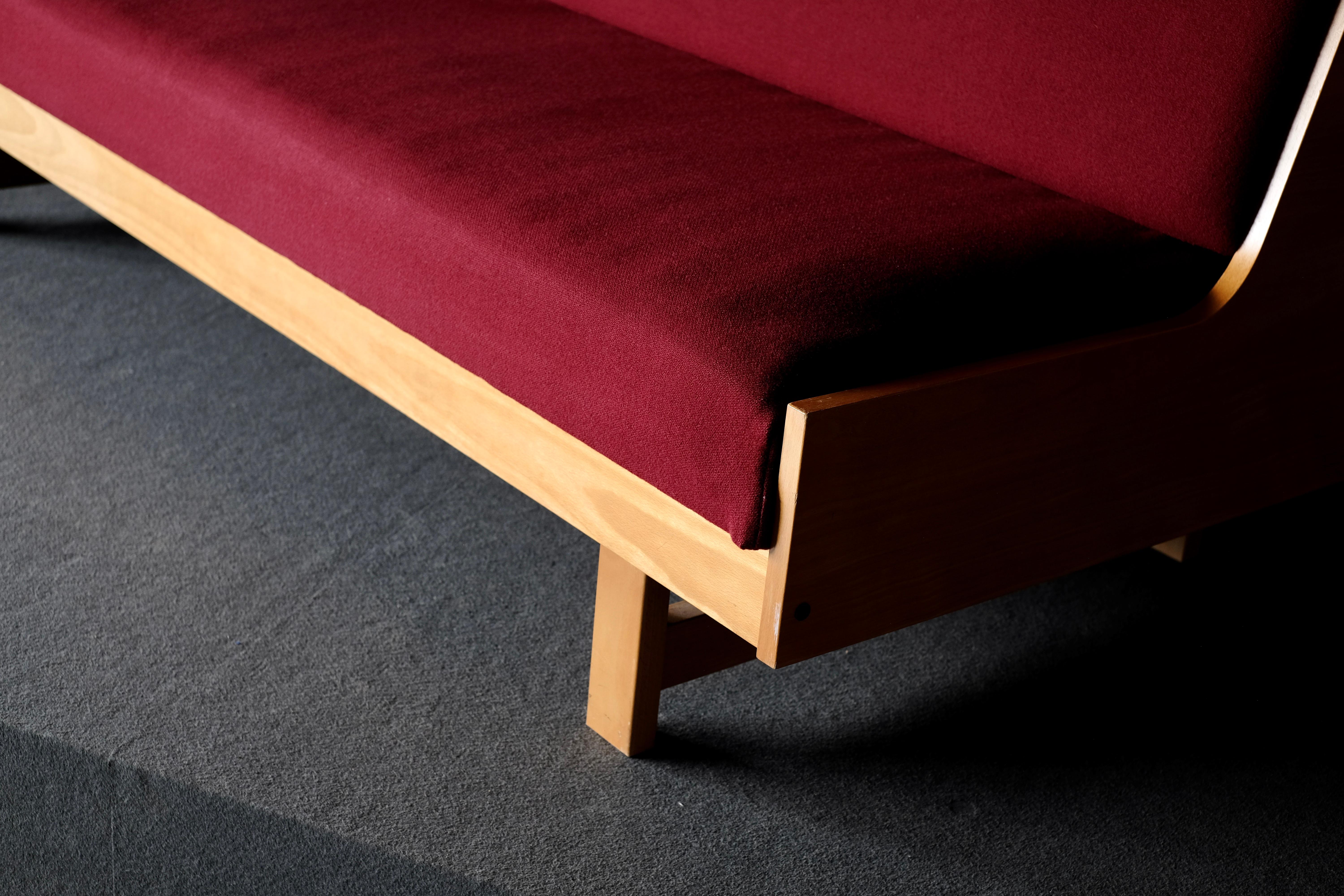 Sofa, which opens out to a daybed. It is upholstered in wool. Really clever mechanism makes this very functional and a real space saver.