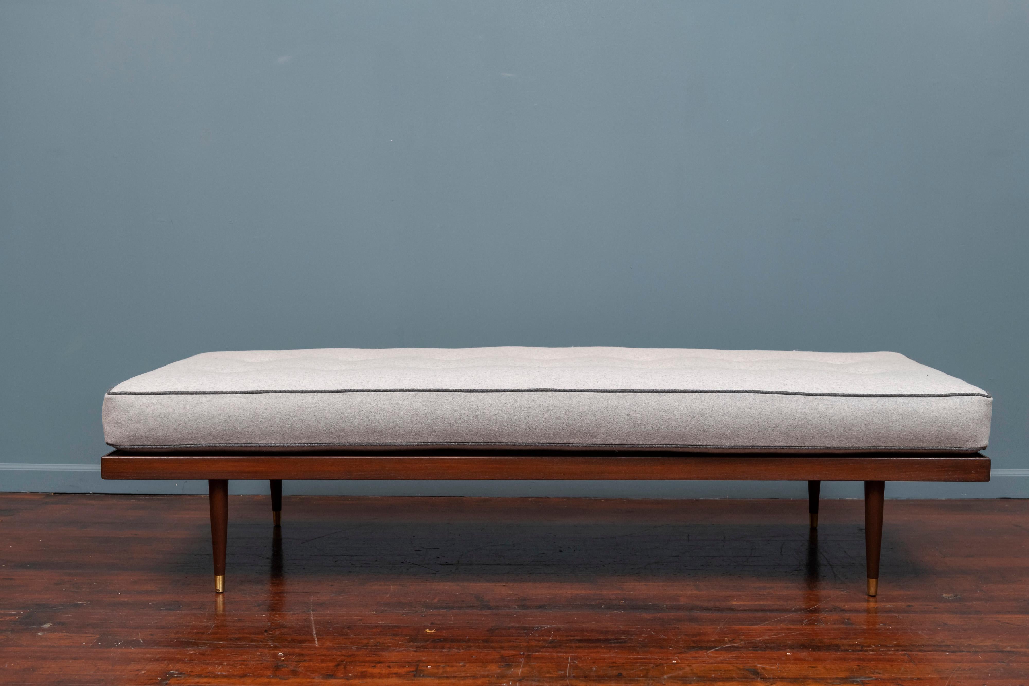 Midcentury daybed newly upholstered in a light gray wool felt on a refinished walnut frame with good spring support, very comfortable.