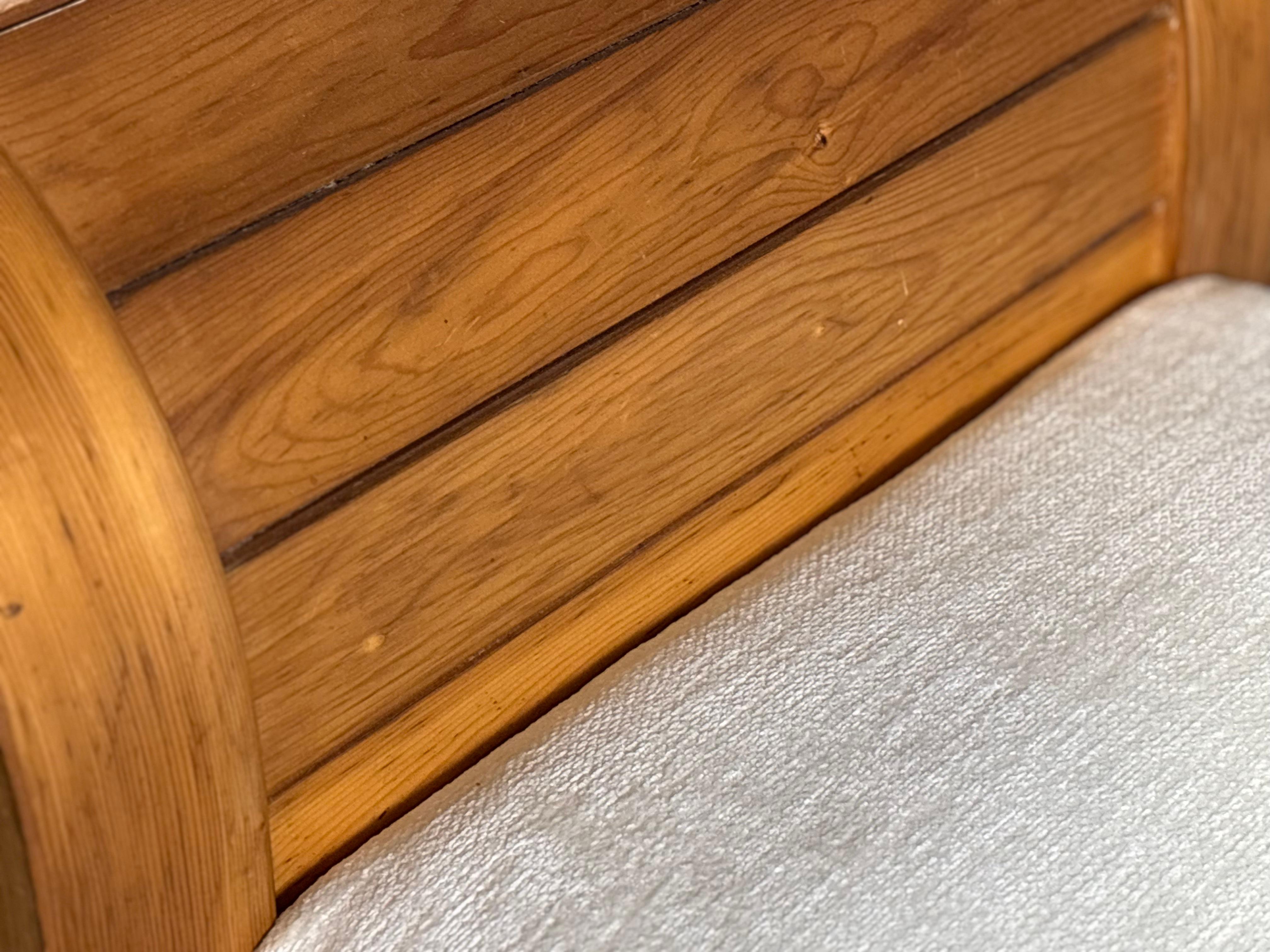 Fabric Mid-Century daybed in sculpured curved wood, 1950s For Sale