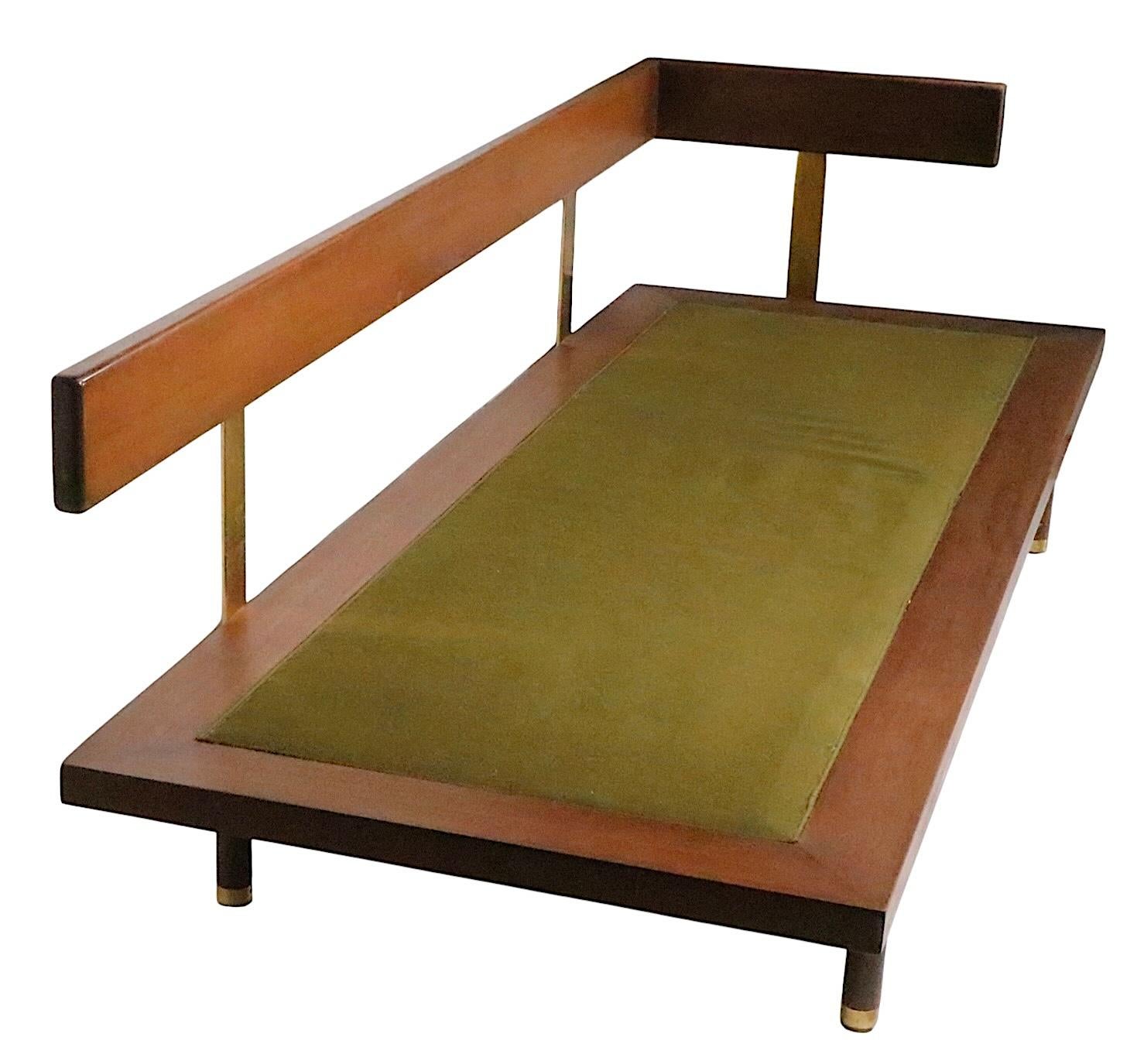 Exceptional, chic, voguish and rare mid century sofa, daybed, designed by Harvey Probber. This stunning example features an architectural frame constructed of solid brass and mahogany, with original sexy lavender leather cushions. The low slung