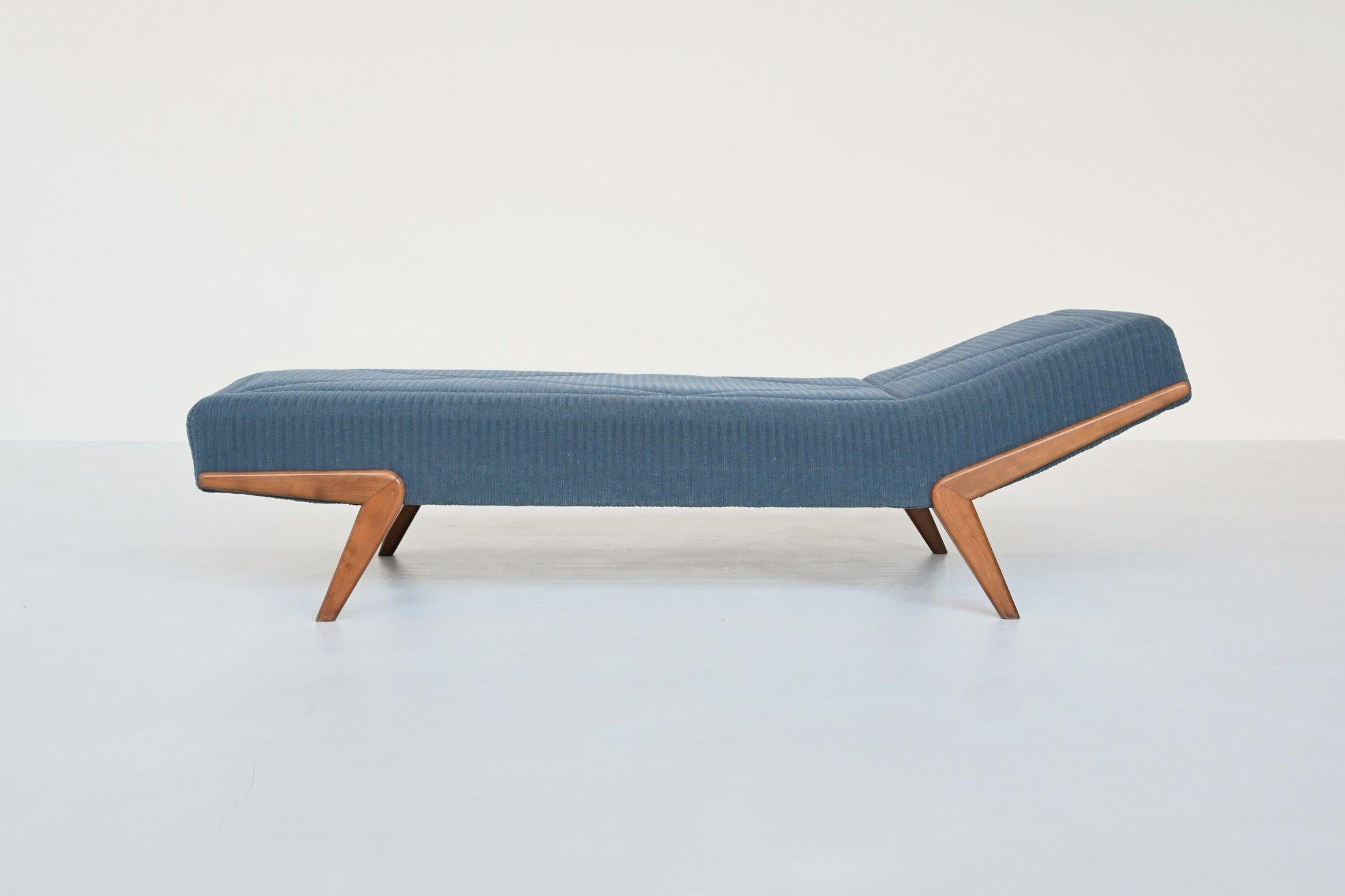 Beautiful shaped Mid Century daybed by unknown manufacturer or designer, Germany 1960. This very nice daybed has solid teak boomerang legs and the mattress is upholstered with original jeans blue fabric. This upholstery is a great contrast with the
