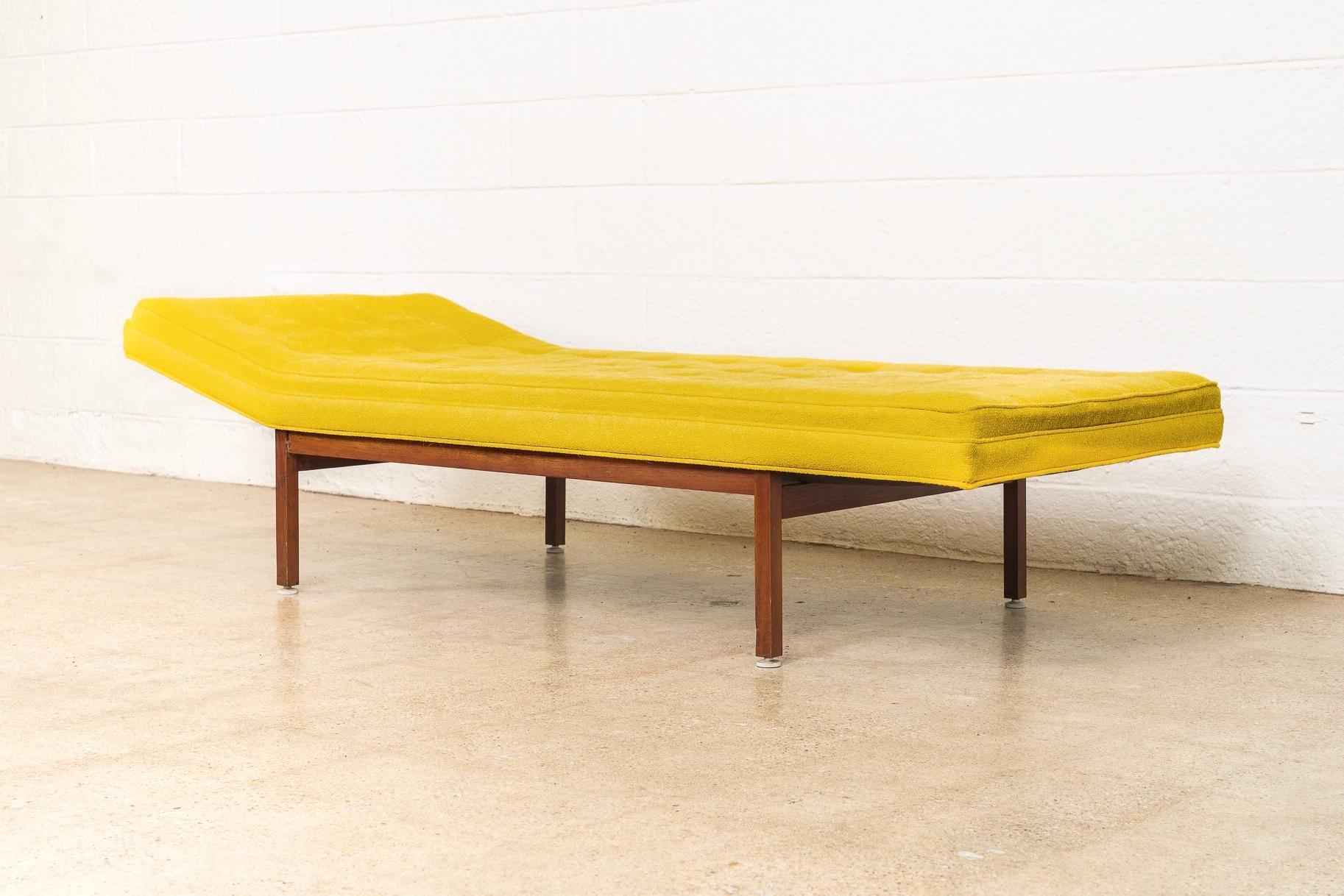 This incredible vintage daybed sofa in the style of George Nelson or Jens Risom is circa 1960. With Classic Mid-Century Modern styling, this unique piece features clean lines and a low profile with a gently angled headrest. The sofa was