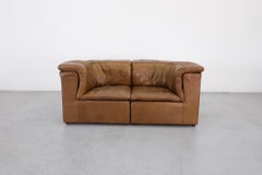 Mid-Century De Sede Style Two Piece Leather Loveseat by Laauser