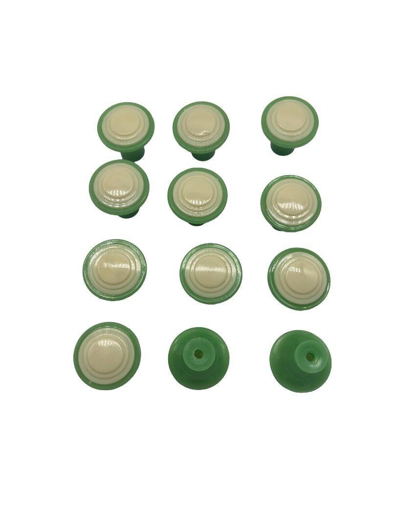 1950s or possibly 1940s bakelite mid-century green and ivory-colored bakelite. These cute candy green drawer pulls that have never been used, or chipped, are in pristine condition. Perfect for any addition to your mid-century home or furniture.

Set