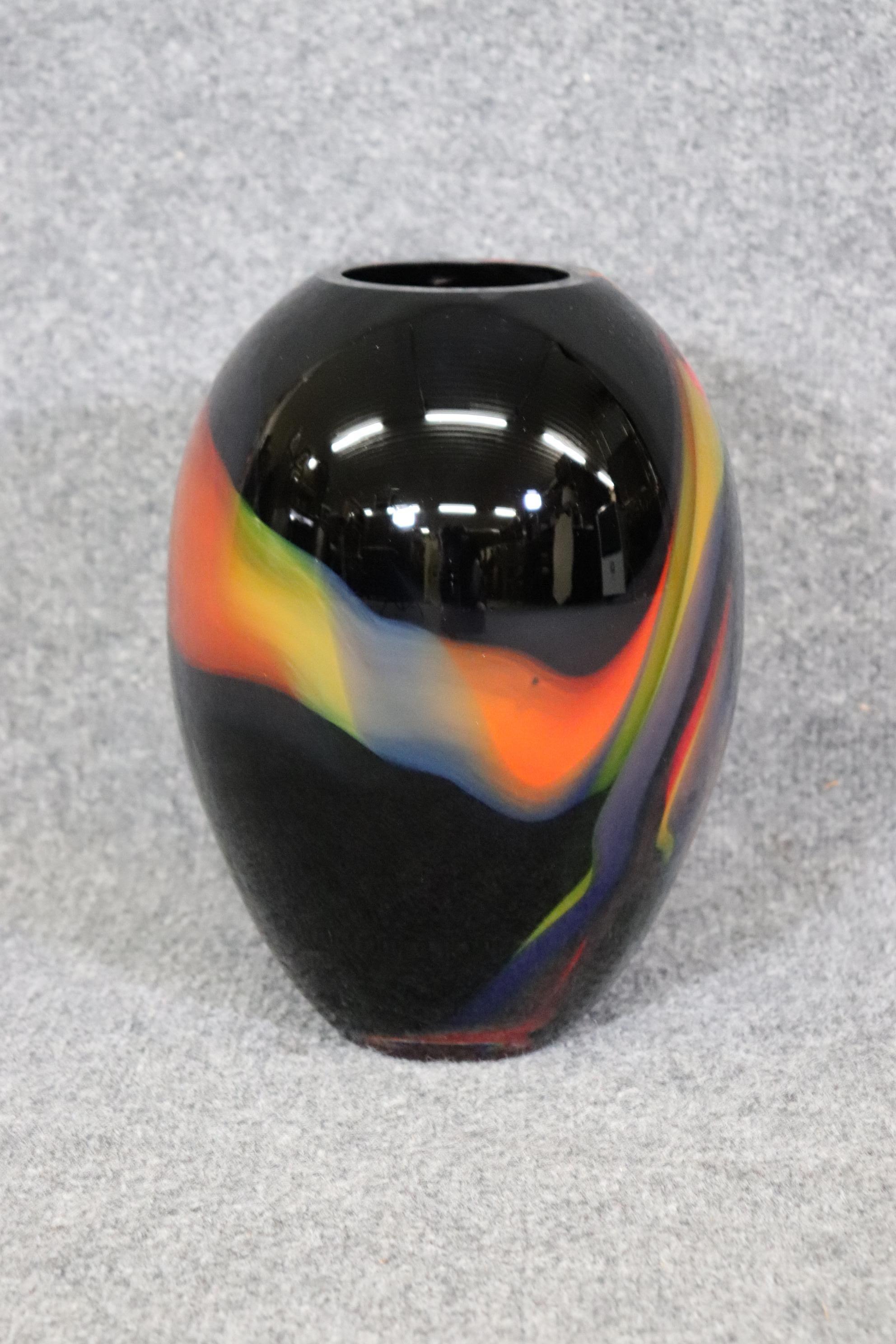 Dimensions: Height: 11 in Width: 7 3/4 in Depth: 7 3/4 in 
This Mid Century Deco art glass vase was made in the manner of John Dunand and is made of the highest quality. If you look at the photos provided, you will see the flowing design in mid