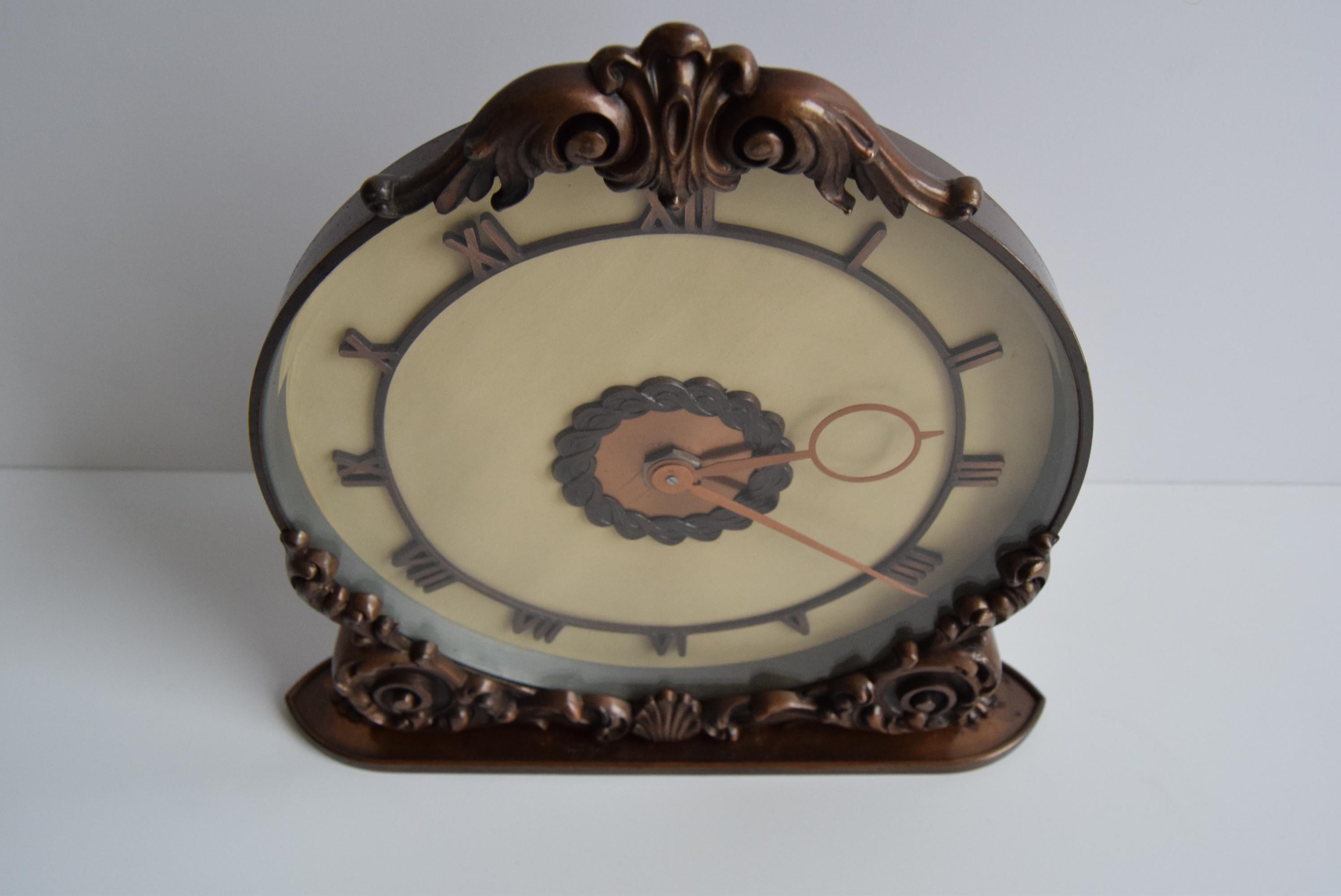 
A beautiful Brass wind-up clock with Roman numerals
Made of glass, plastic, brass, metal
Fully functional
Beautiful decoration
Good condition with aging patina
