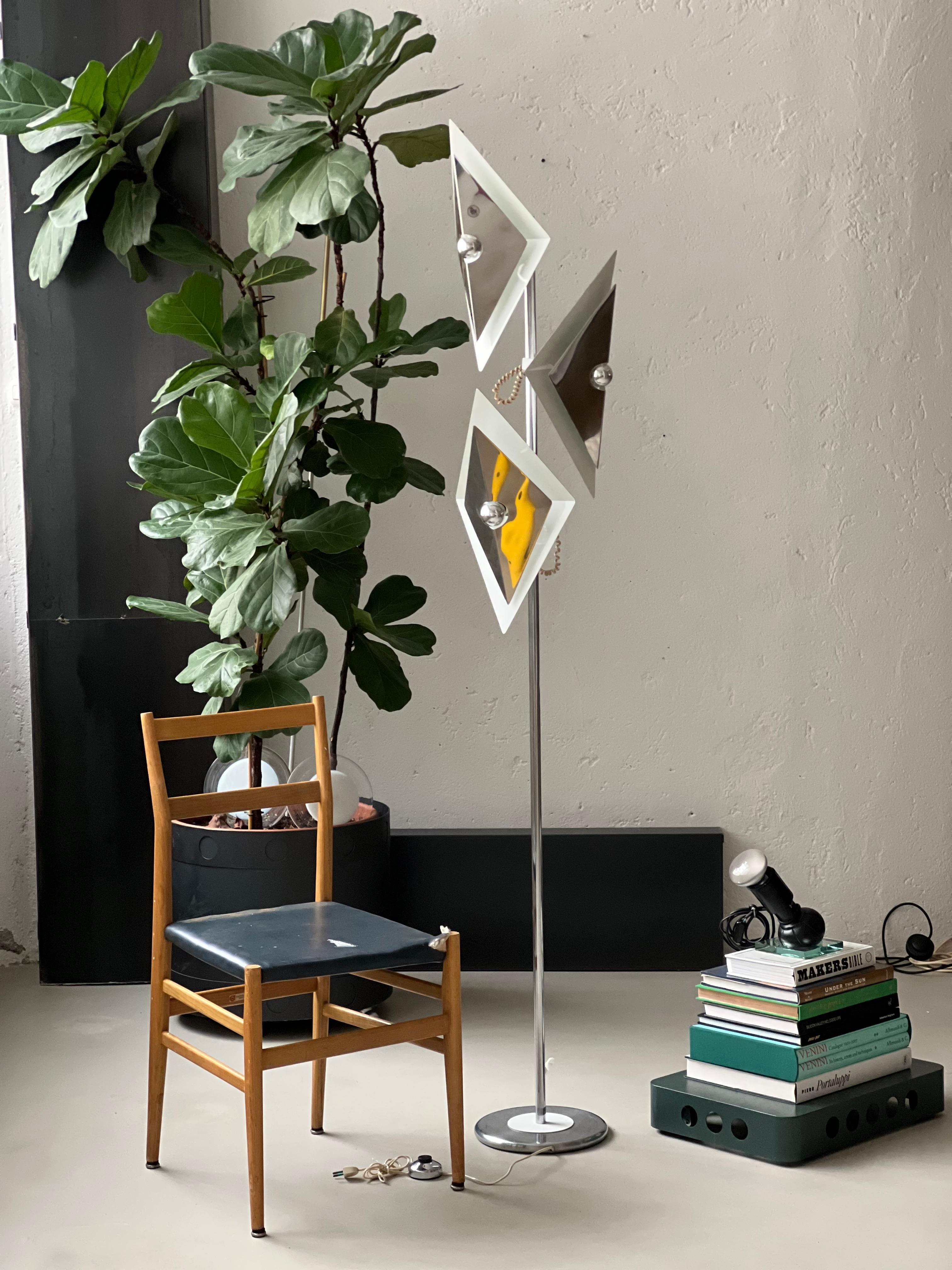 Mid-Century Modern Lamp - Chromed Floor Lamp - Gio Ponti Style Lamp

Offered for sale is a seldom-seen and extremely attractive floor lamp in chromed and white-lacquered metal. Manufactured by O.M.A. Italia, whose label is still crisp and clearly