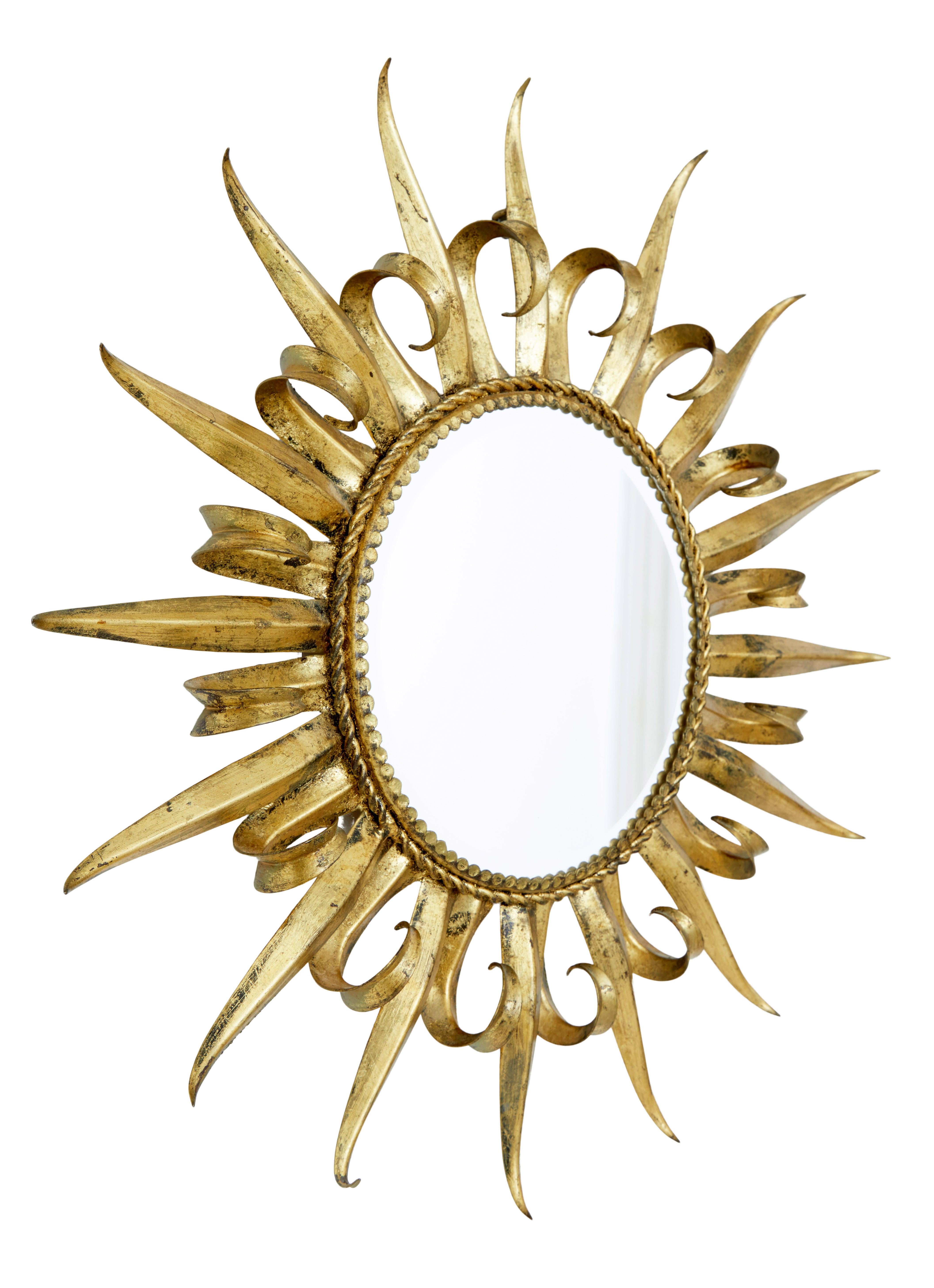 Hand-Crafted Mid century decorative sunburst mirror For Sale