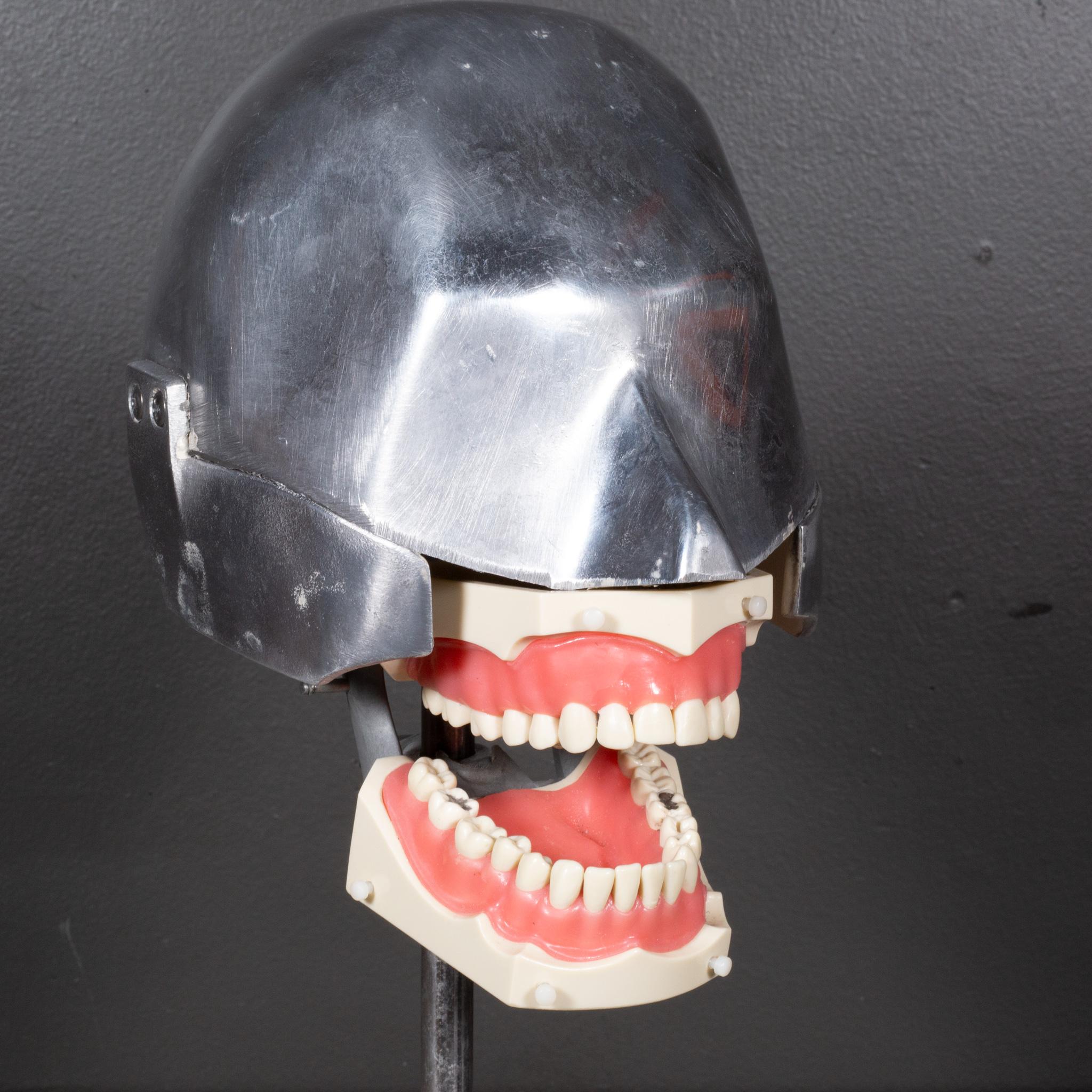 ABOUT
A mid-century dental school practice head, known as a dental phantom head, with aluminum skull, articulating mouth and solid steel custom stand. Very training purposes, the mouth is anatomically accurate with soft, rubber gums and removable