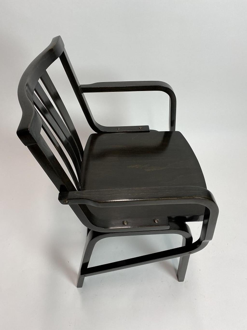Black mid-century design armchairs by TON Bystrice pod Hostýnem 1950s. Professionally stained and repolished.