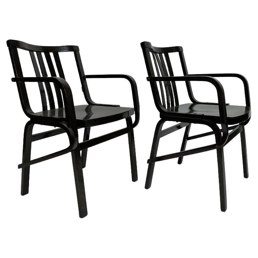 Fauteuils noirs design du milieu du siècle dernier