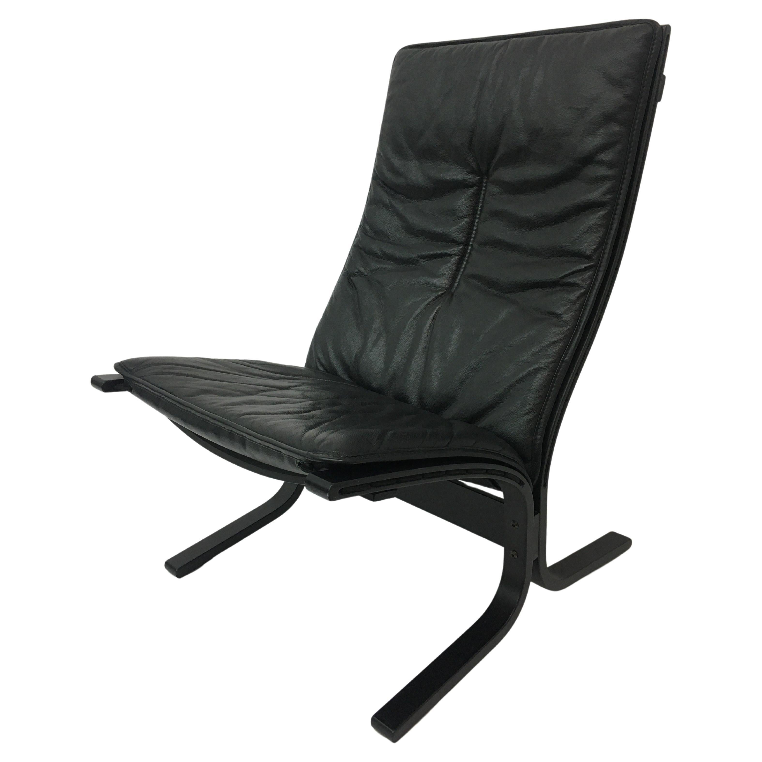 Mid-Century design black leather lounge chair by Ingmar Relling for Westnofa For Sale