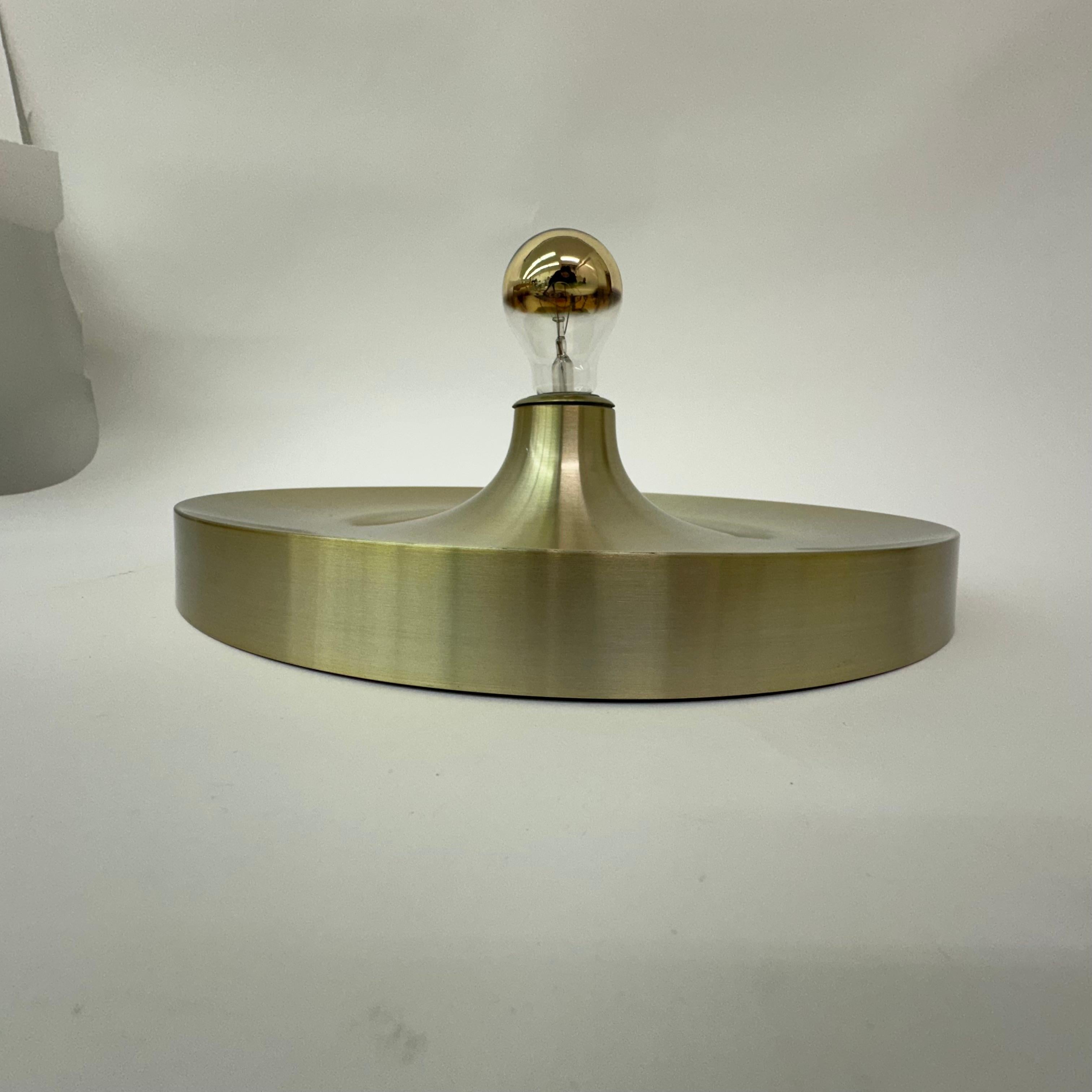 German Mid Century design gold wall lamp disc , 1970’s For Sale