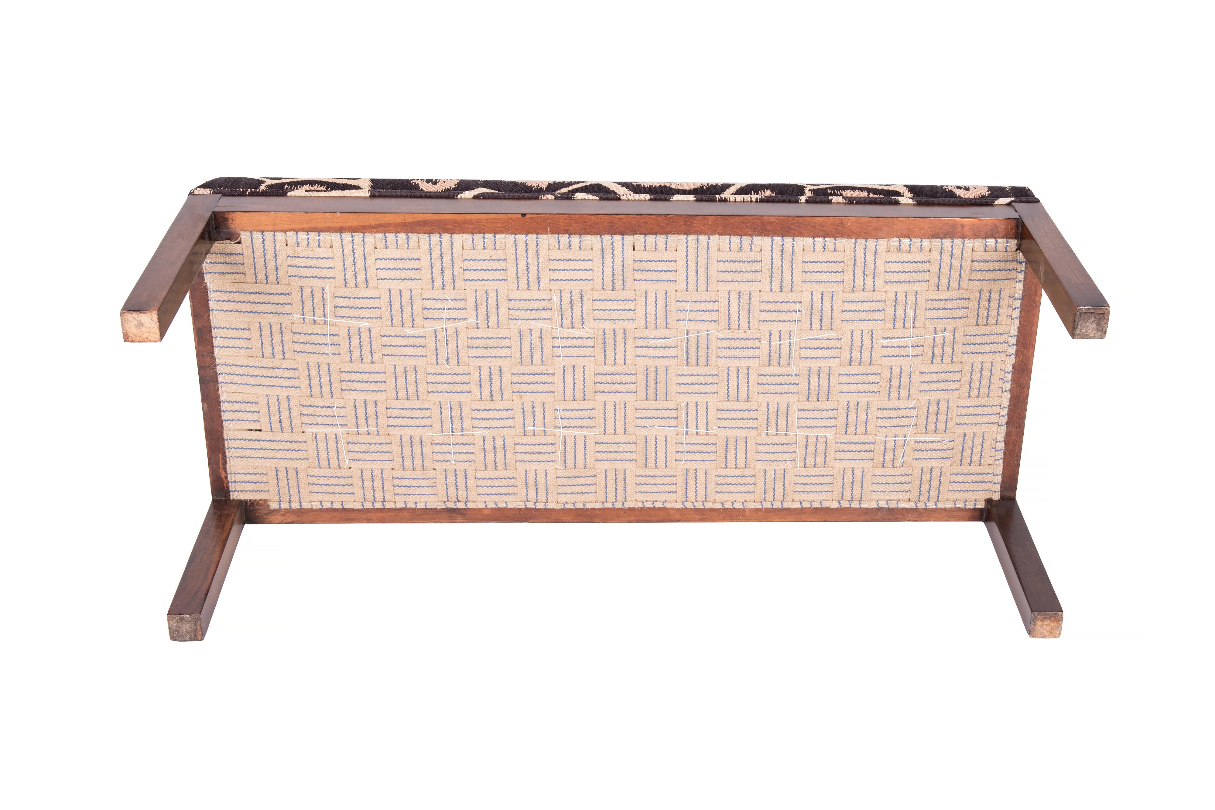 Midcentury design solid wood bench -ottoman reupholstered with a brown coloured fabric with 