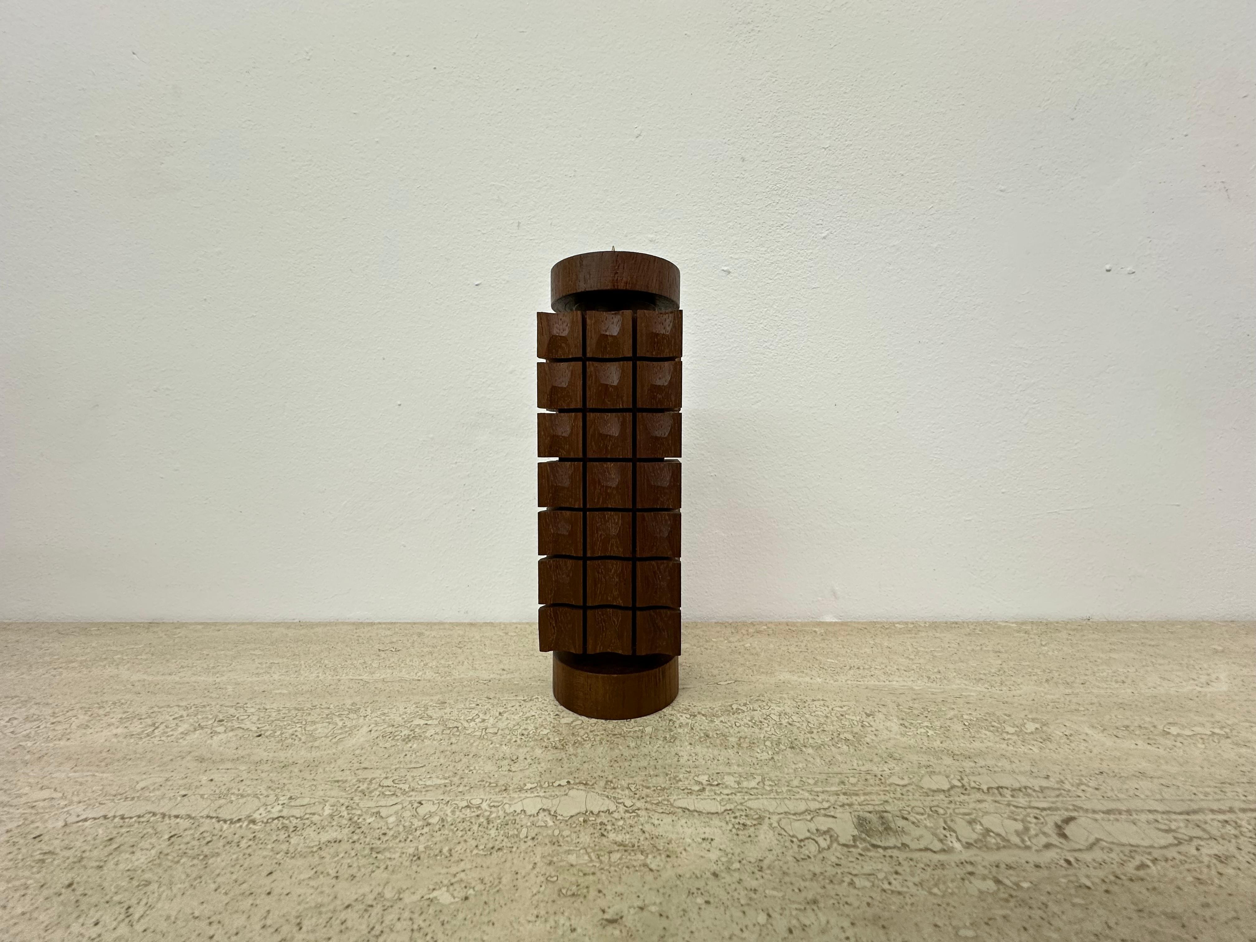 Mid Century design teak wooden candle holder , 1970s

Dimensions: 19cm Height , 5,5cm Width , 5.5cm Depth
Material: Teak wood
Color: Brown
Period: 1970’s