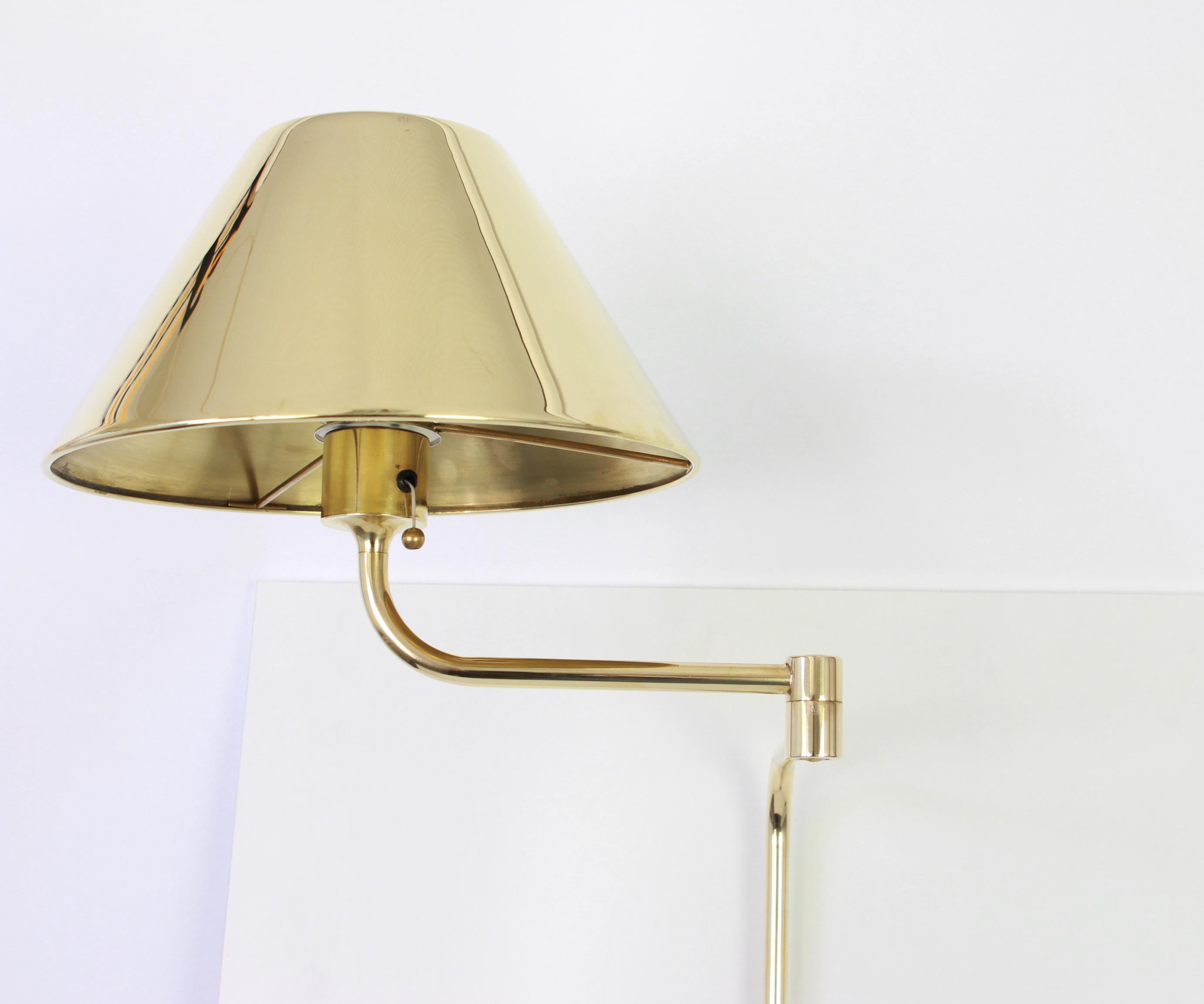 Midcentury designer brass wall sconces by Florian Schulz, 1980s
The wall light needs 1 x E27 standard bulb.


Dimensions:

Height approximate 85 cm, 33.4 inches, the height is adjustable.(Picture Nr.3)
Width 54 cm, 21.2 inches

Good