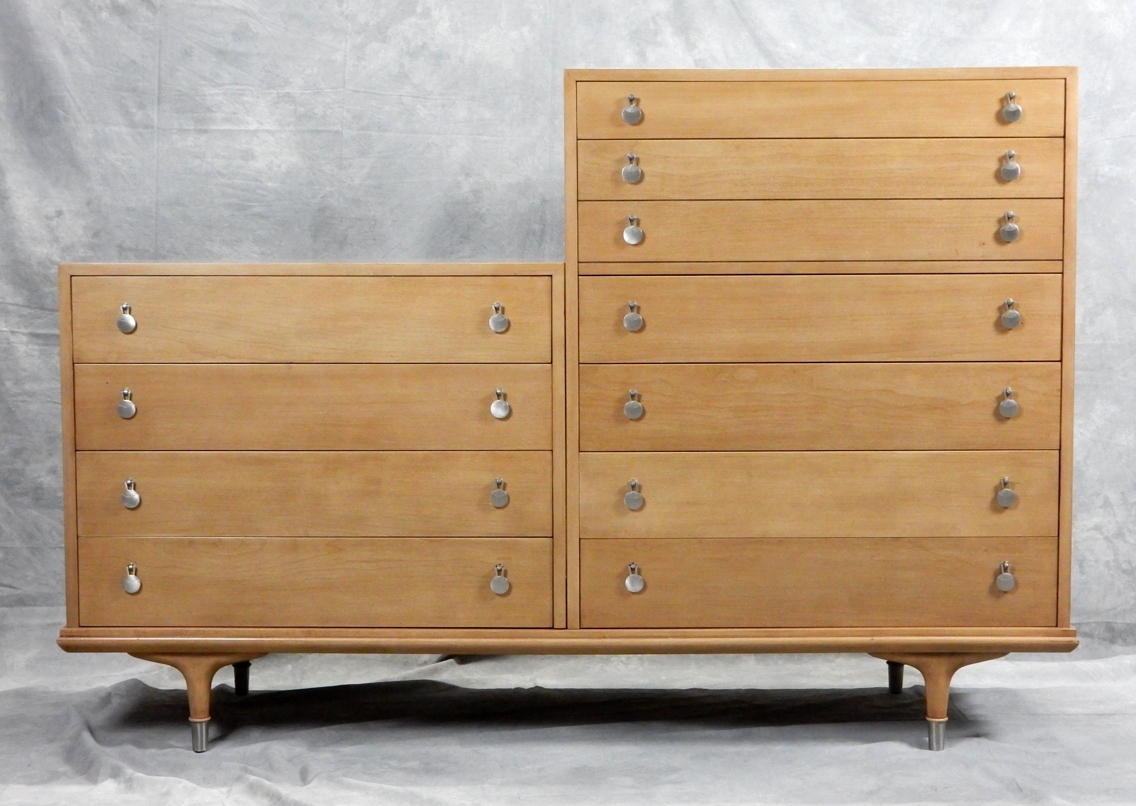 Exceptional quality chest of drawers by designer Renzo Rutili for Johnson Furniture, circa 1950.
Linear design with doorknocker metal pulls. 10 drawers in all.
Each of the 2 drawer cabinets set perfectly into base frame(each attached with 4