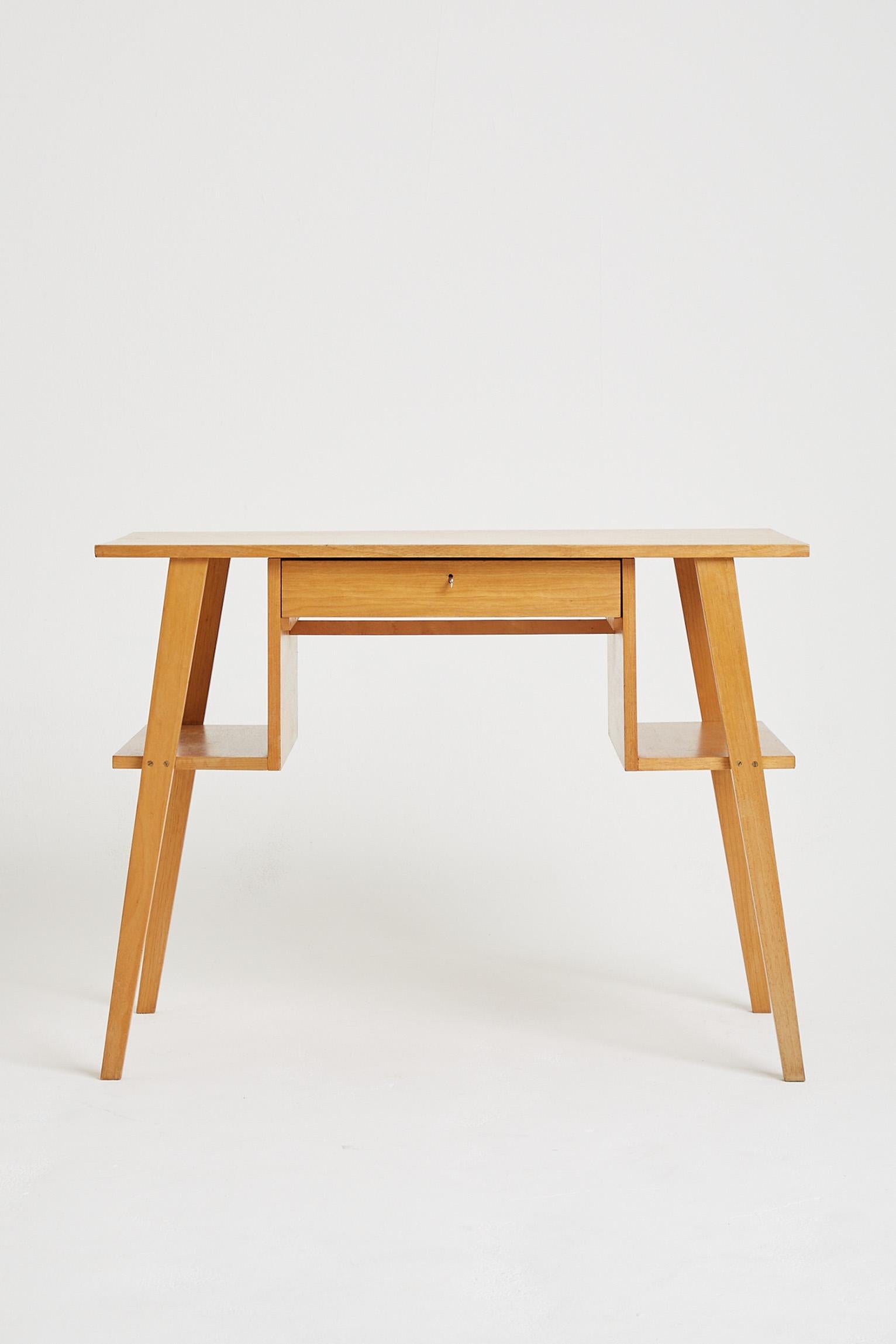 A bich veneered desk by Cees Braakman.
The Netherland, Circa 1950.