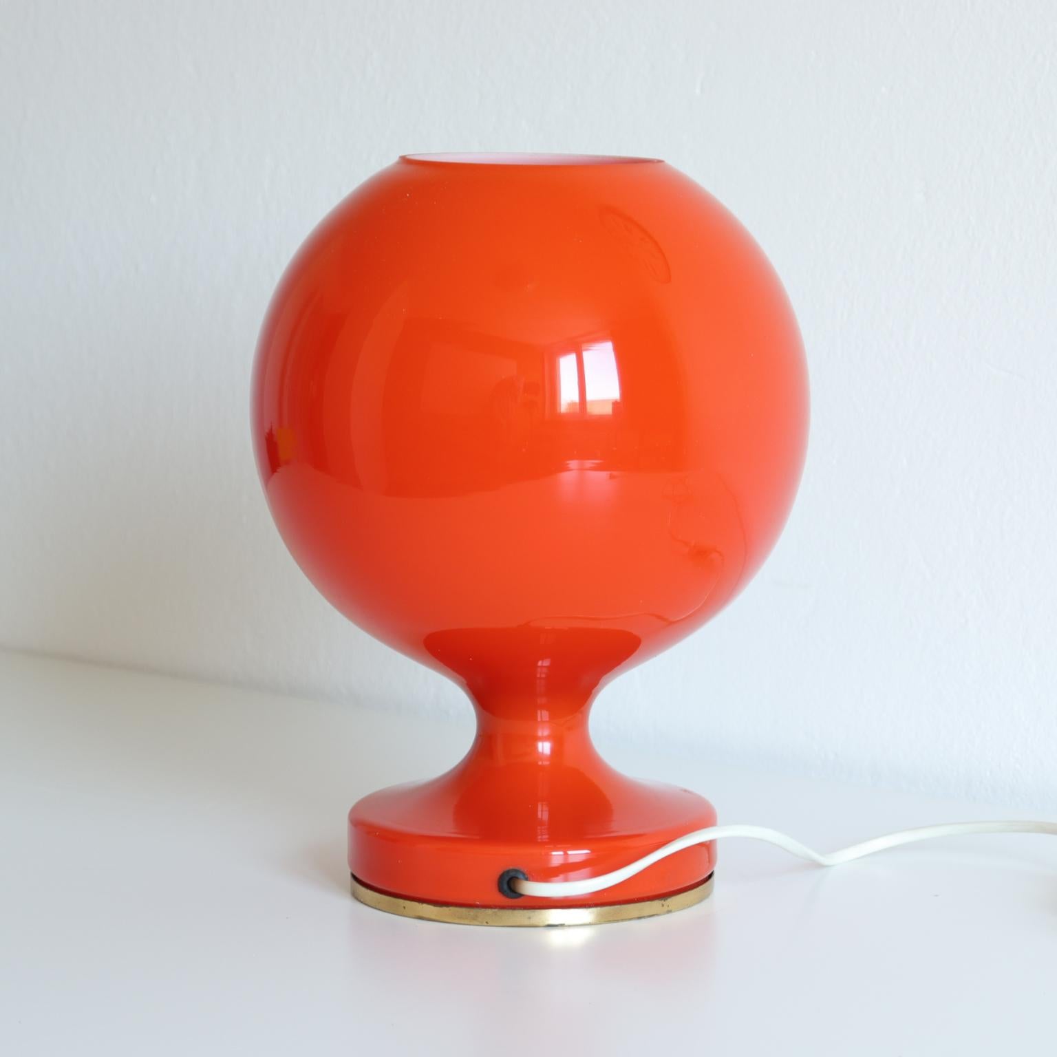 This table lamp was designed by the Czech designer Štepán Tabery for OPP Jihlava in the 1960s. It's made from opaline glass and is in great original condition. Original functional wiring. Original manufacturer label on the bottom.

The lamp can be