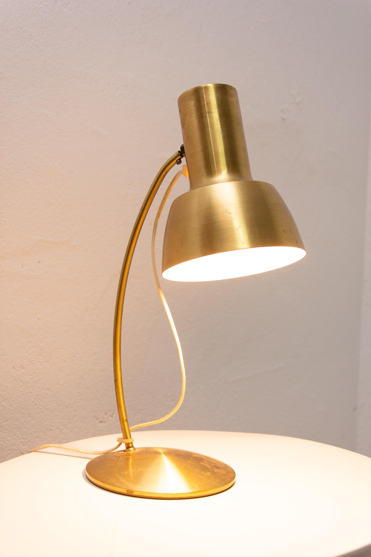 Midcentury table lamp, associated with “Brussels period” and world-renowned EXPO58. It was made in the former Czechoslovakia in the 1960s. Painted in gold color. Material: metal, aluminum, plastic. In very good Vintage condition, fully functional,