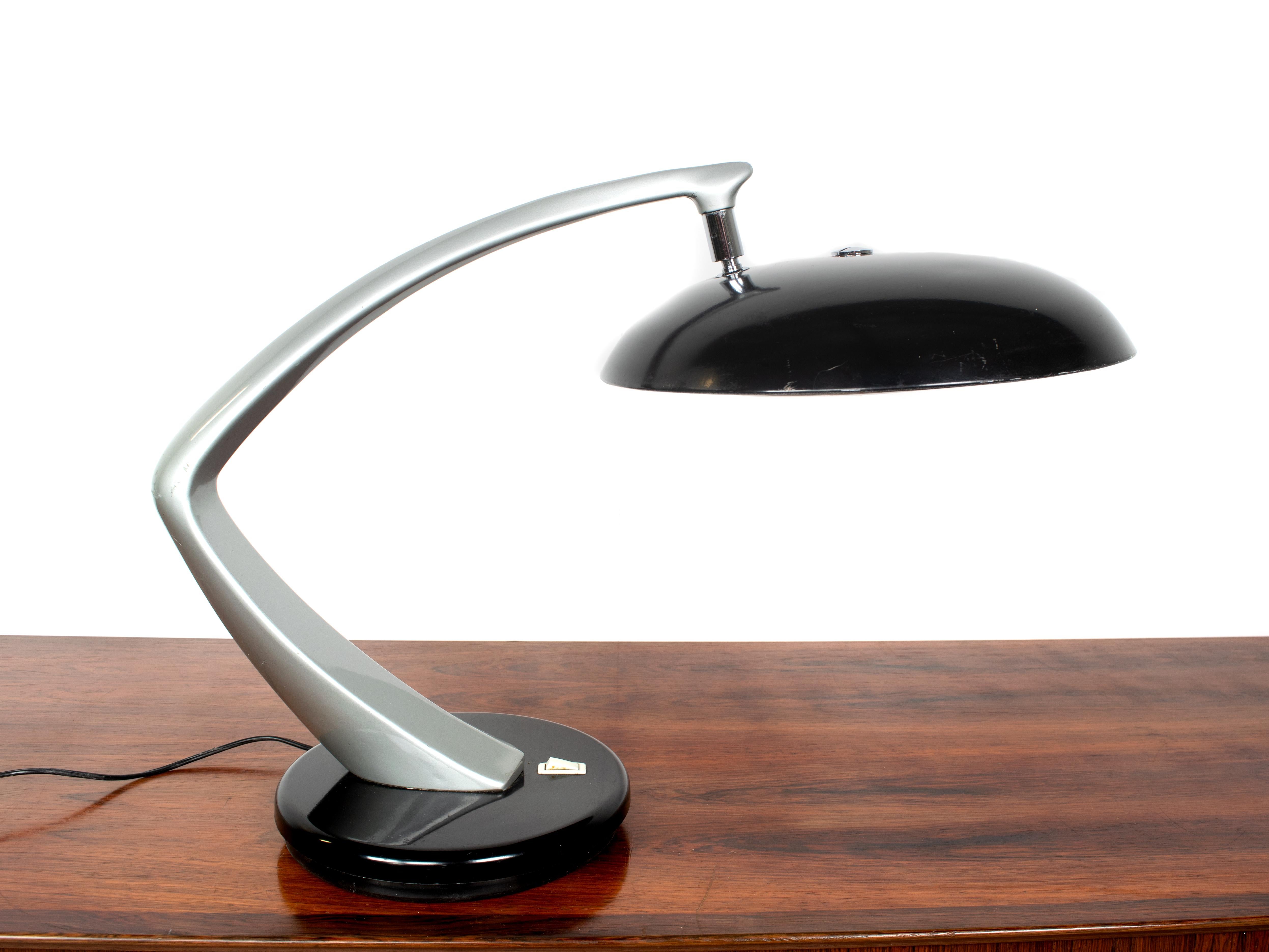 Midcentury desk lamp model 'Boomerang' by Fase from Spain, 1960s. This lamp is has a grey body and black hood, both in metal. The table lamp is 360 degrees turnable, which is very practical. It has a white diffuser, which is in good condition