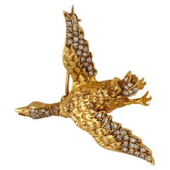 Mid Century diamond 18k yellow gold goose brooch
