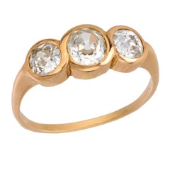 Mid Century diamond 18k yellow gold three stone ring