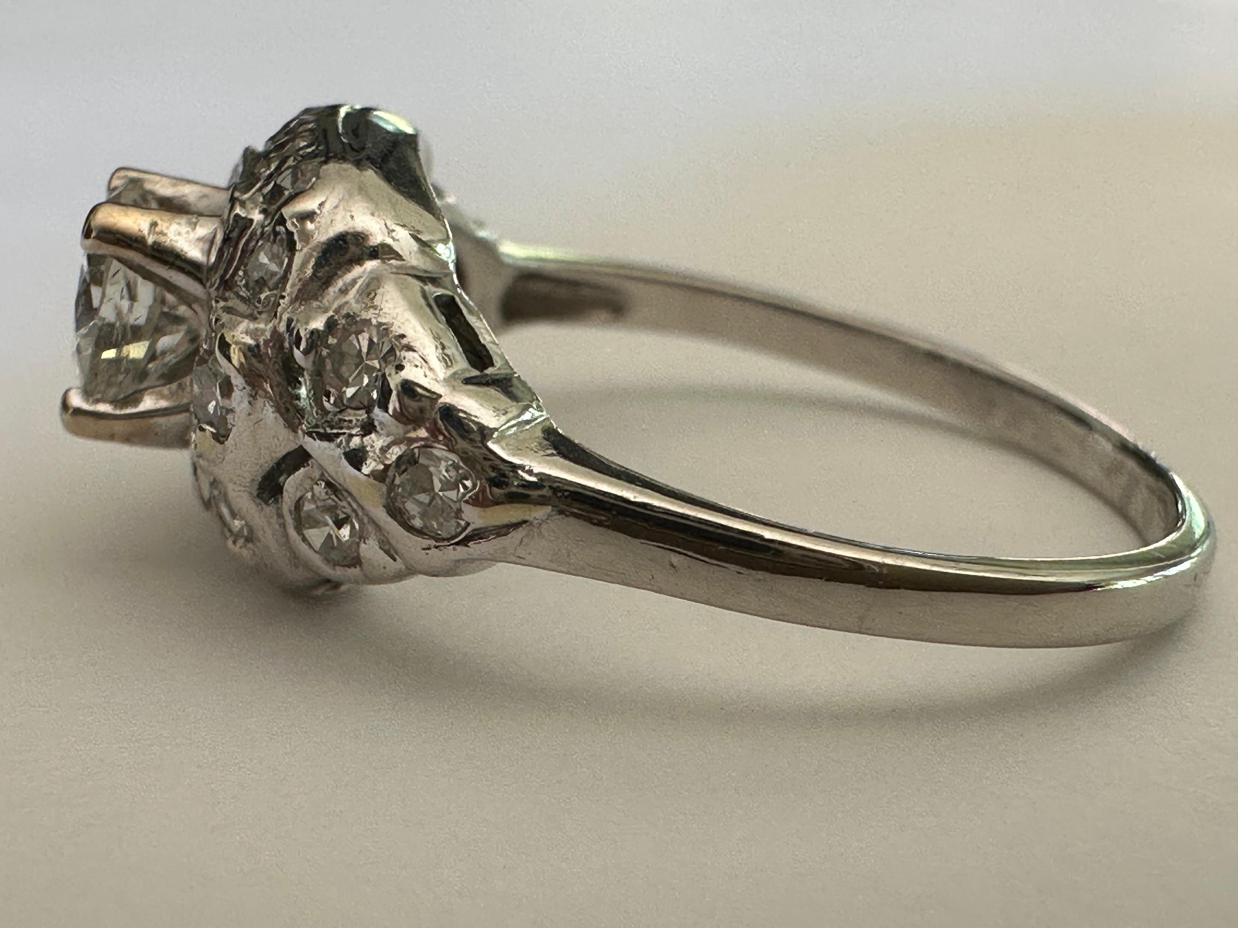 Verlobungsring aus Diamant und Platin aus der Mitte des Jahrhunderts (Retro) im Angebot