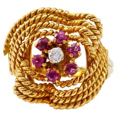 Cocktailring aus 18 Karat Gelbgold mit Diamanten und Rubinen mit Seil