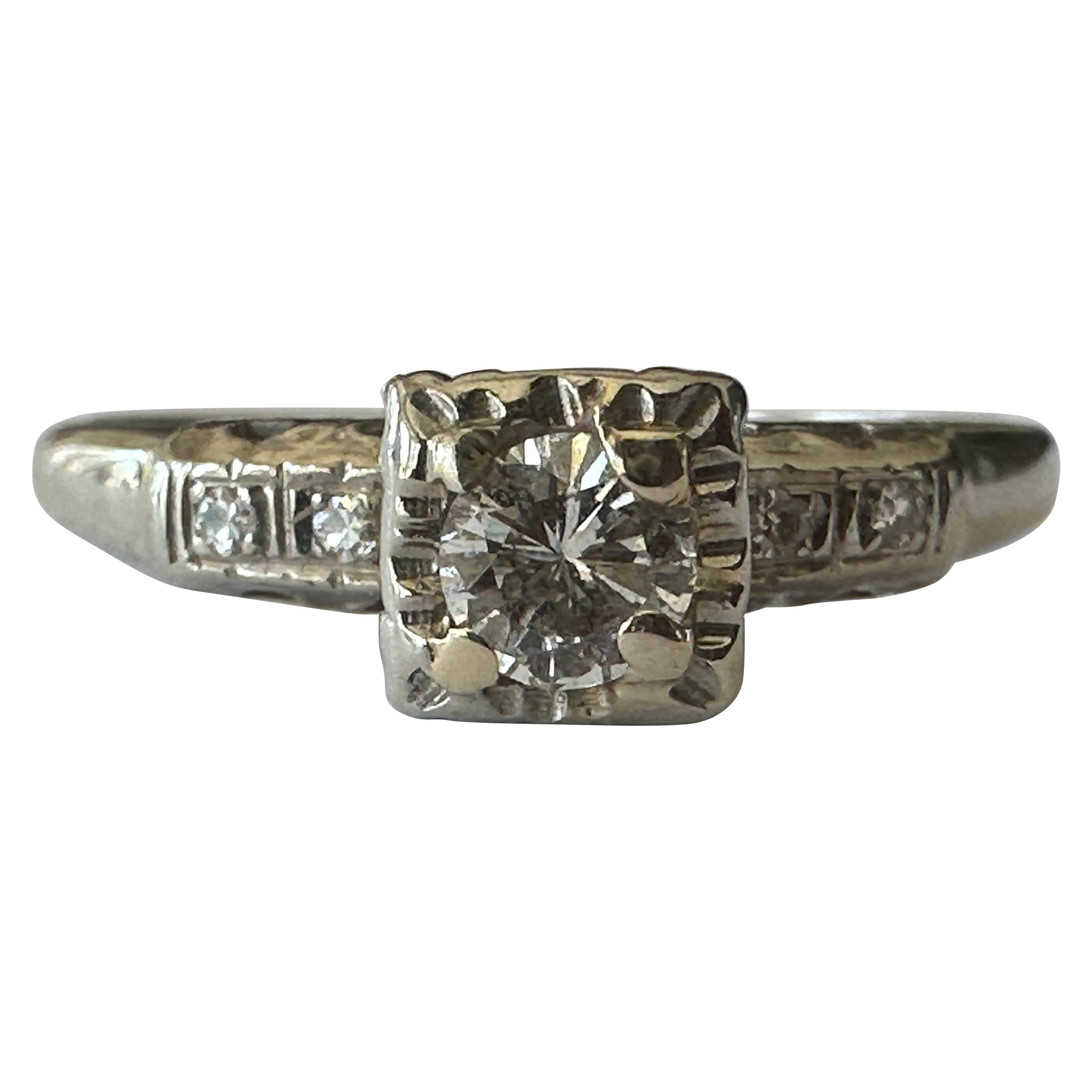 Bague de fiançailles à diamant du milieu du siècle