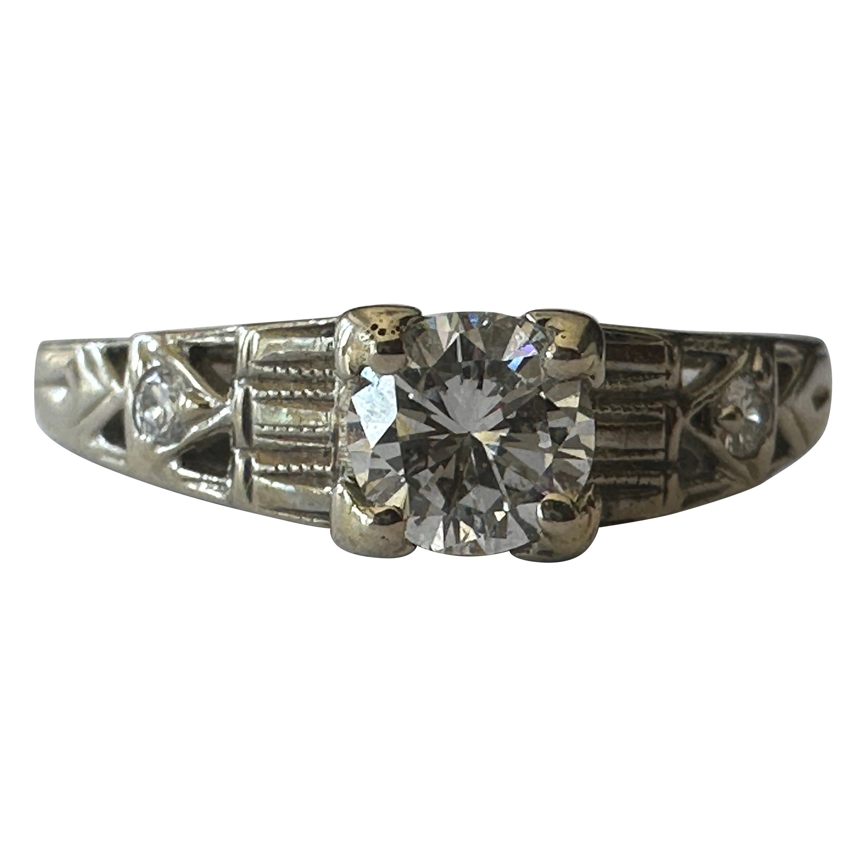Anillo de compromiso de diamantes de mediados de siglo