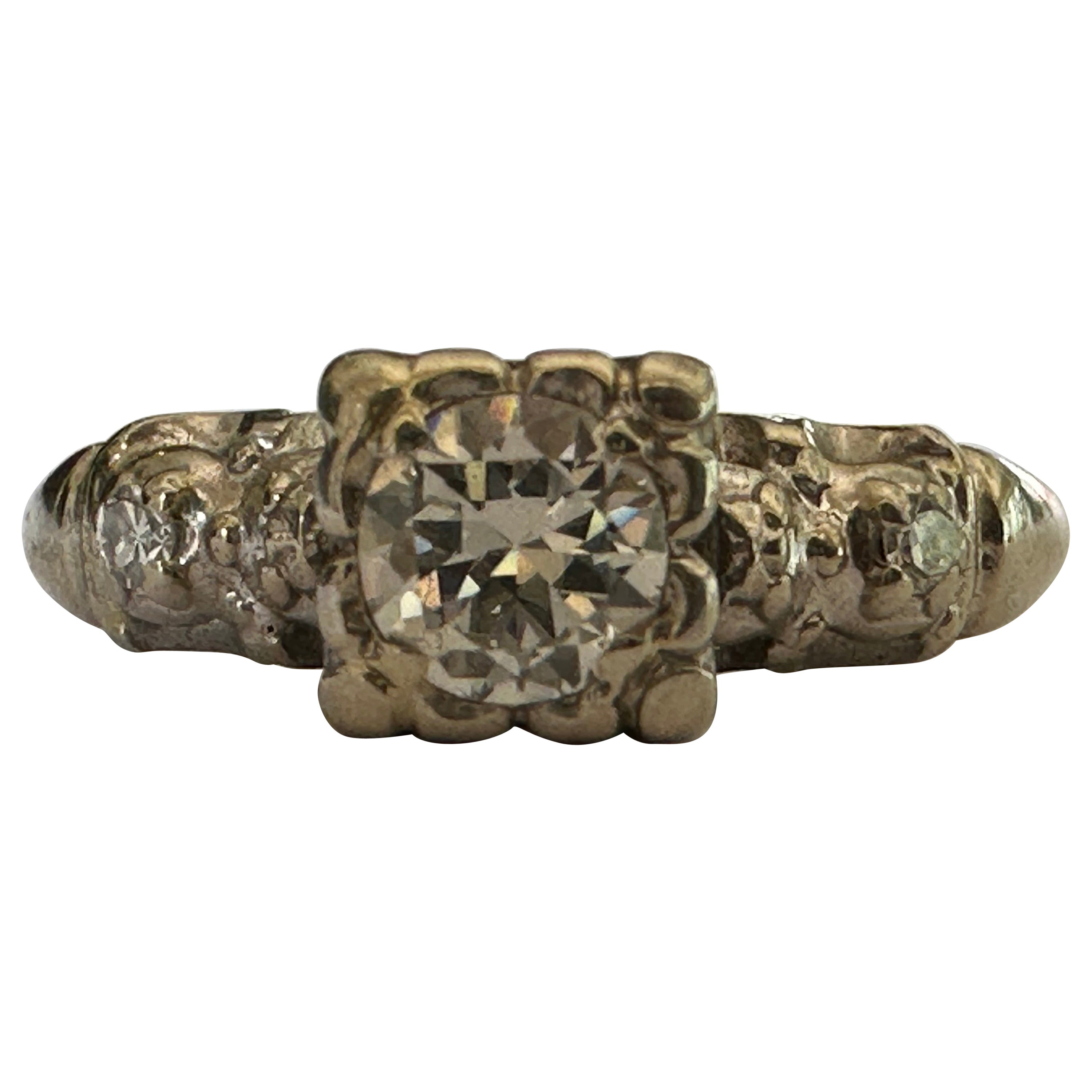 Anillo de compromiso de diamantes de mediados de siglo