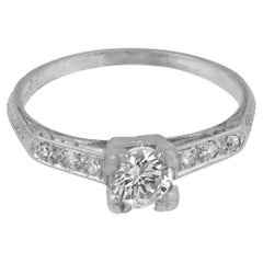 Mid Century diamond platinum engagement ring