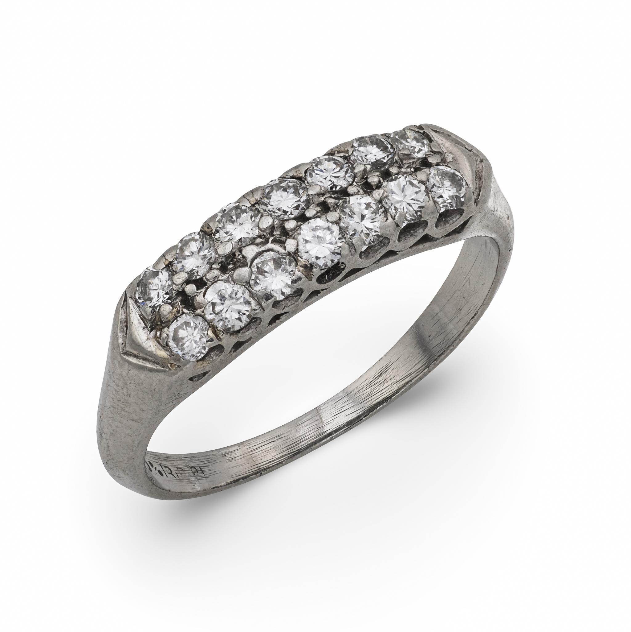 Fede nuziale in platino con diamante del Mid Century