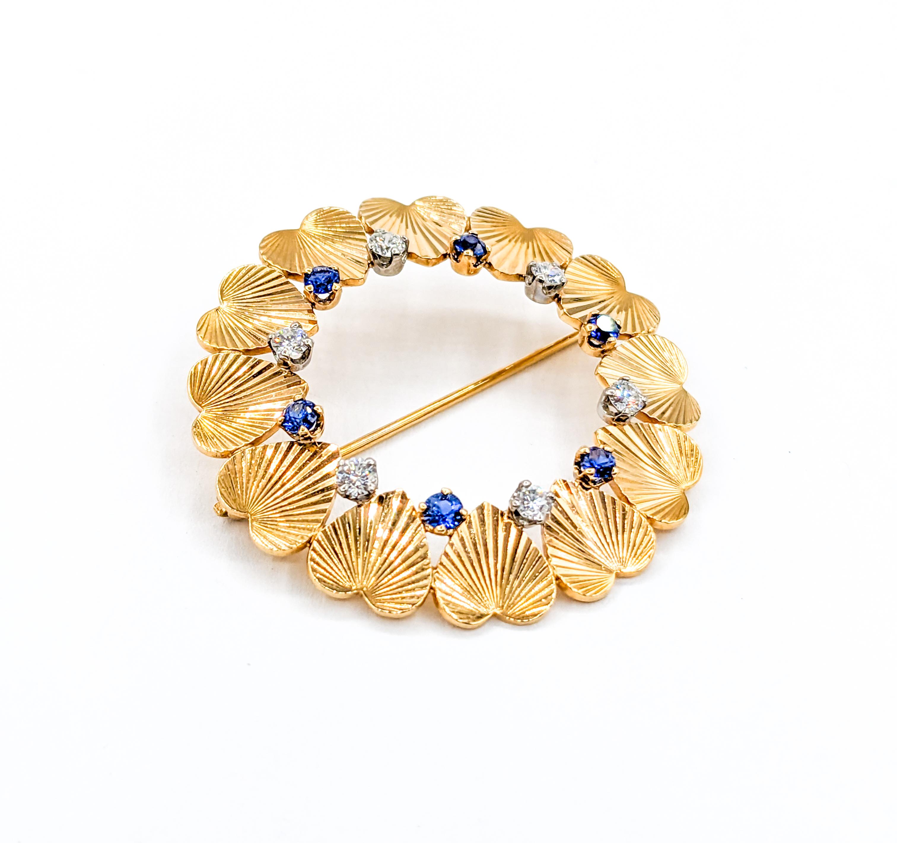 Wonderful Mid-Century Diamond & Sapphire Heart Brooch in 14K Gold

Fall in love with this exquisite Mid-Century Heart Wreath Brooch, finely crafted in bright 14k yellow gold. The hearts are expertly engine turned, enhancing the beautiful textural