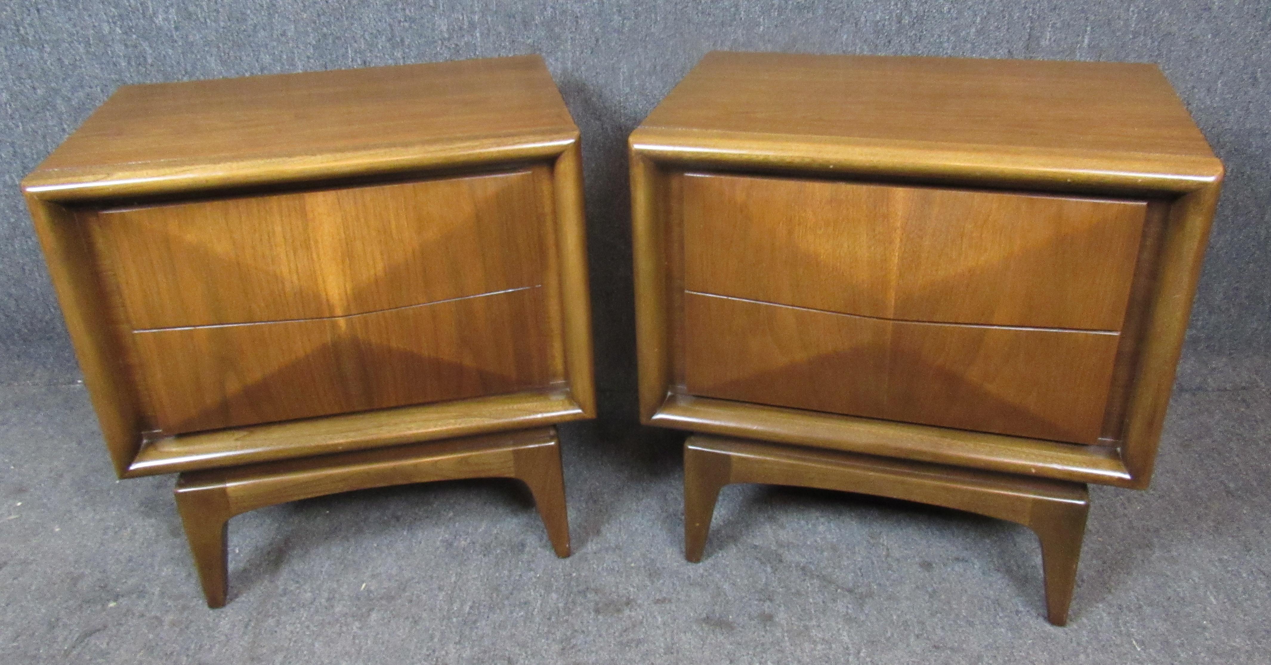 Pair of midcentury walnut bedside tables by United. Unique diamond front drawers with tapered legs.
Please confirm location NY or NJ.