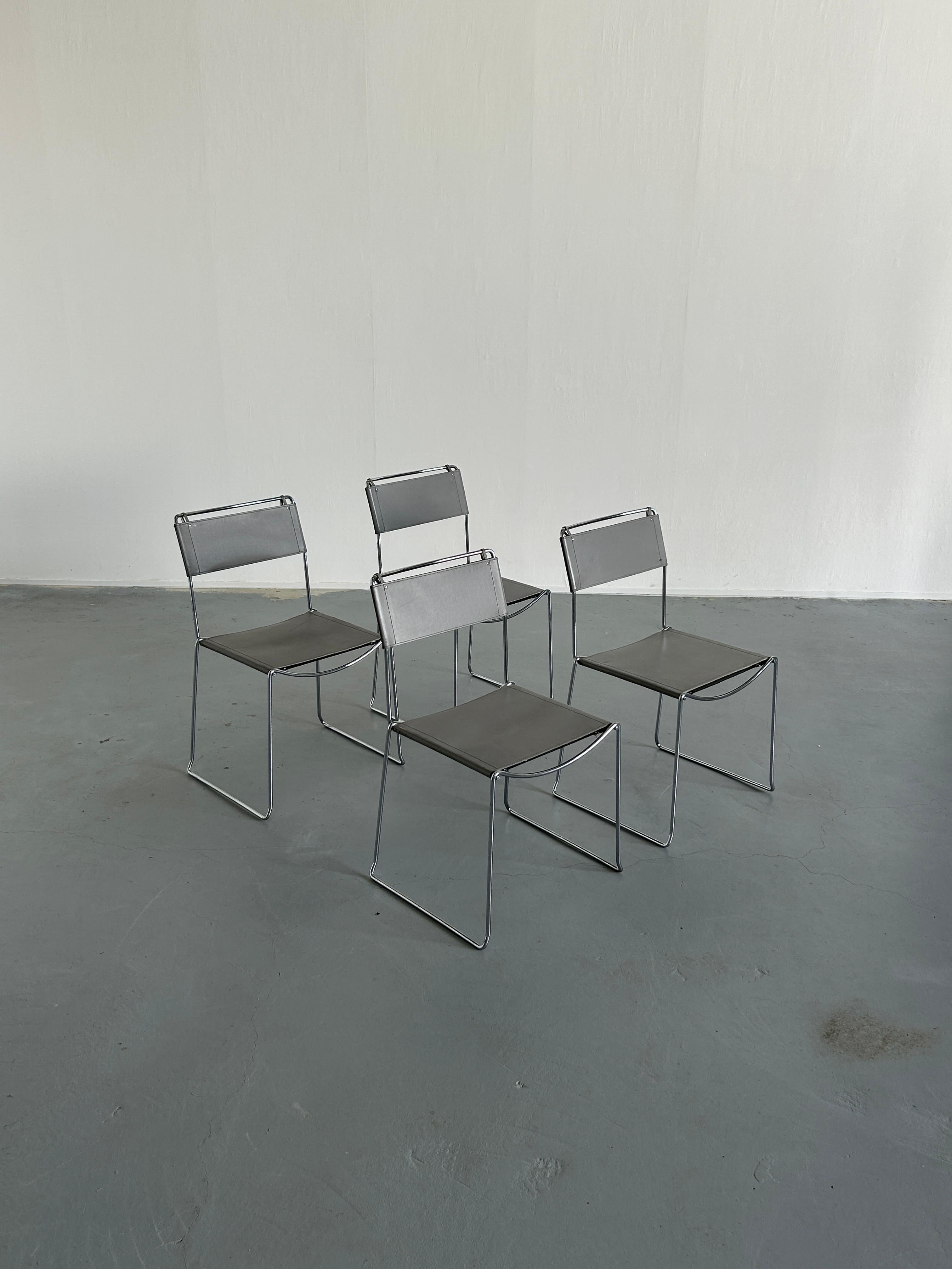 Set of four vintage Italian chrome and leather dining chairs by Giandomenico Belotti for Alias, 1980s Italy.

Chrome metal structure, grey leather backs and seating.
Seat and backrest made from double thick leather with cardboard reinforcement, seat