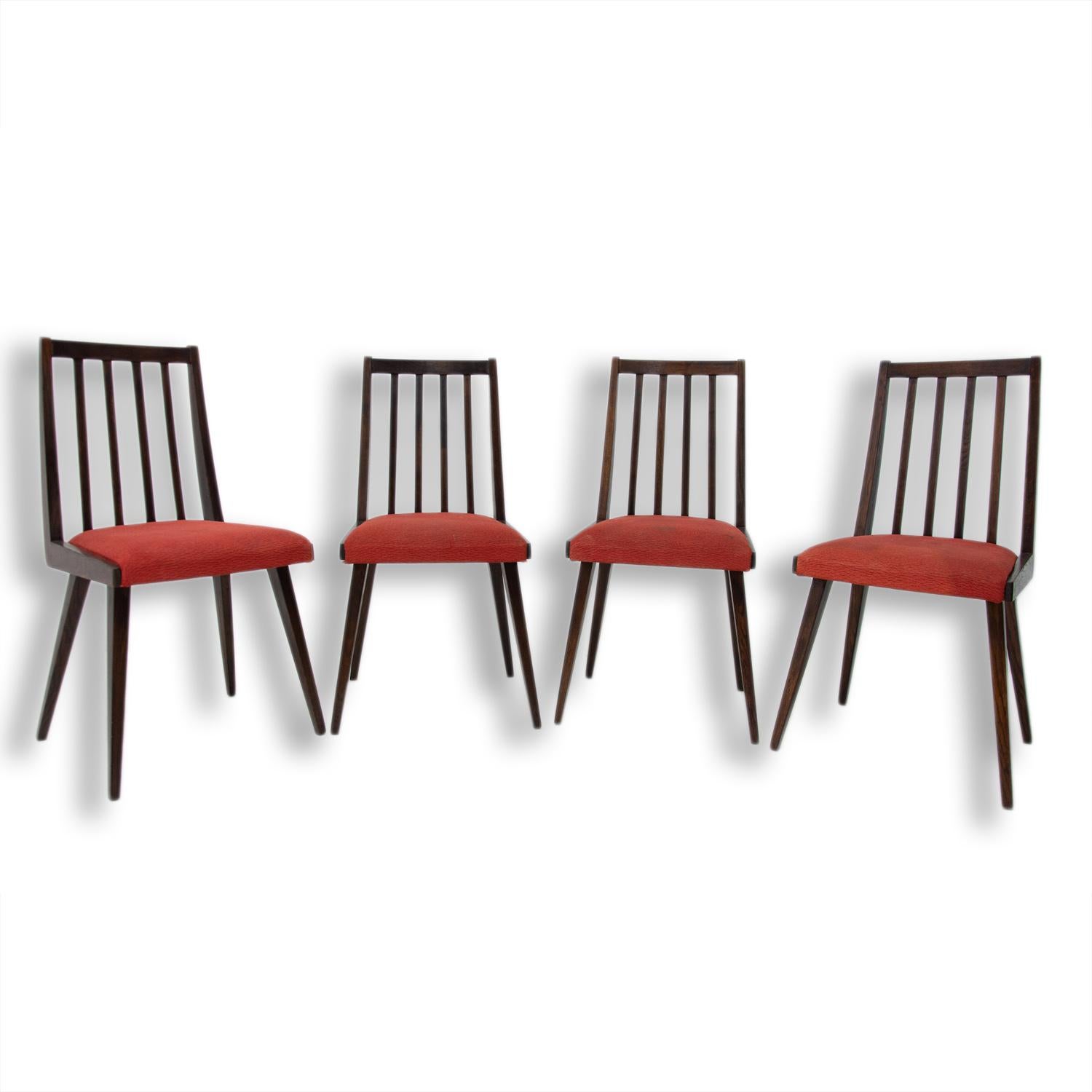 These dining chairs were designed by Jirí Jiroutek for Interiér Praha as part of U-550 living room set. They were made in the former Czechoslovakia in the 1960s. The structure is made of beechwood and the chairs has original upholstery. The chairs