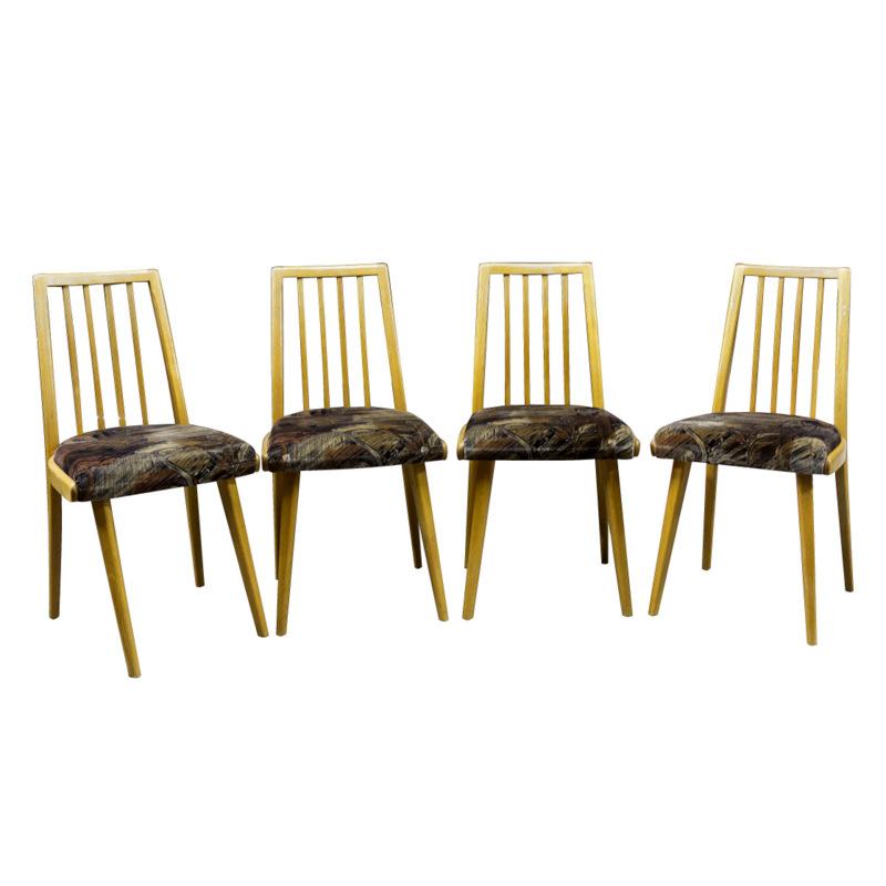 Ces chaises de salle à manger ont été conçues par Jirí Jiroutek pour Interiér Praha dans le cadre de l'ensemble de salon U-550. Ils ont été fabriqués dans l'ancienne Tchécoslovaquie dans les années 1960. La structure est en bois de hêtre. Les