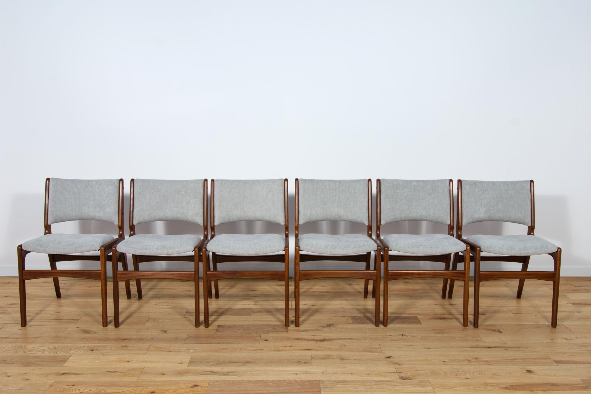 This set of 6  dinning chairs  designed Johannes Andersen in the 1960s. Chairs is made of solid teak wood. Completely restored. The sponges have been replaced and covered in light grey fabric. The teak wood has been cleaned from the old surface and