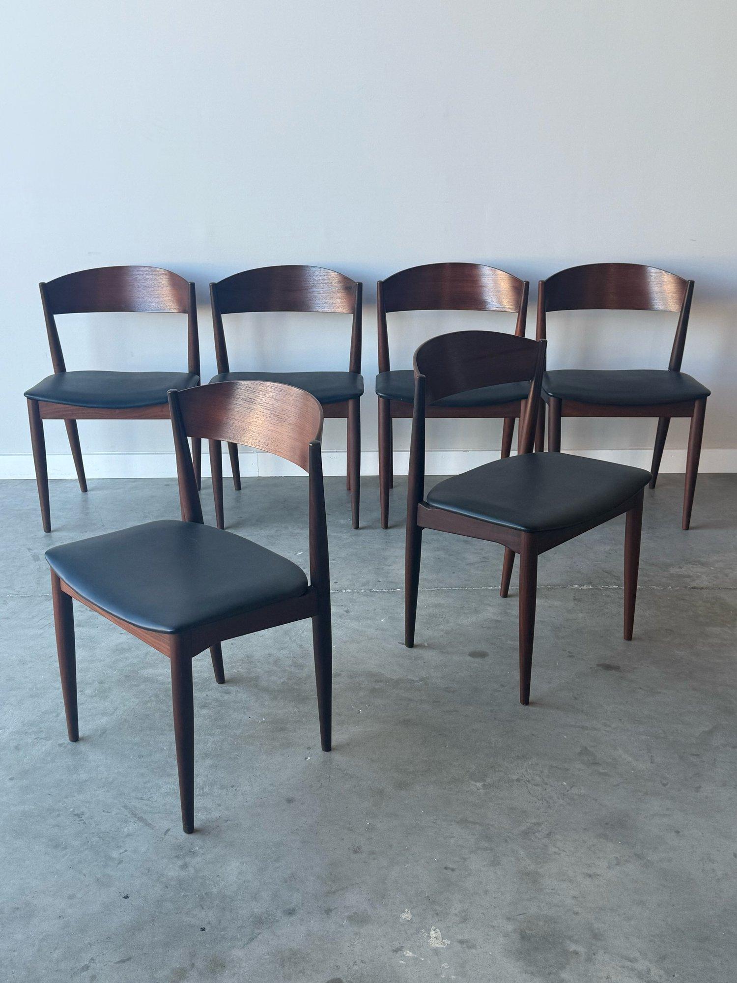 Mid-century set of six dining chairs designed by Jydsk Møbelindustri Skanderborg, Denmark circa 1960s. This set is made with precision and attention to detail. The solid wood frame, offer a sturdy yet graceful silhouette that complements a variety