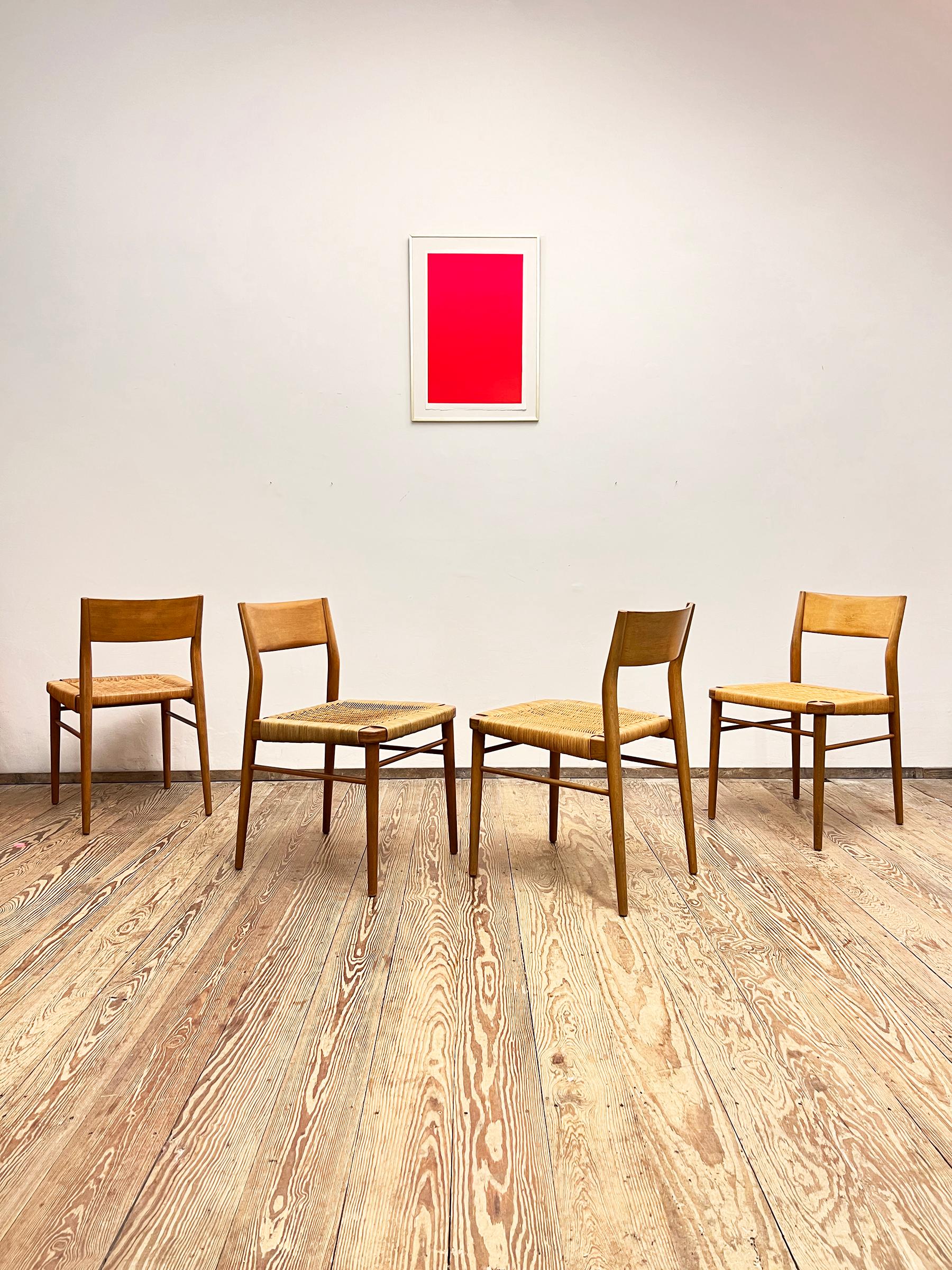 Dimensions: 49 x 47 x 76 x 42cm (width x depth x height x seat height)

This beautiful set of vintage dining chairs, model 351 designed by Georg Leowald was Manufactured by Wilkhahn, Germany. The set features 4 chairs of massive bright wood. The