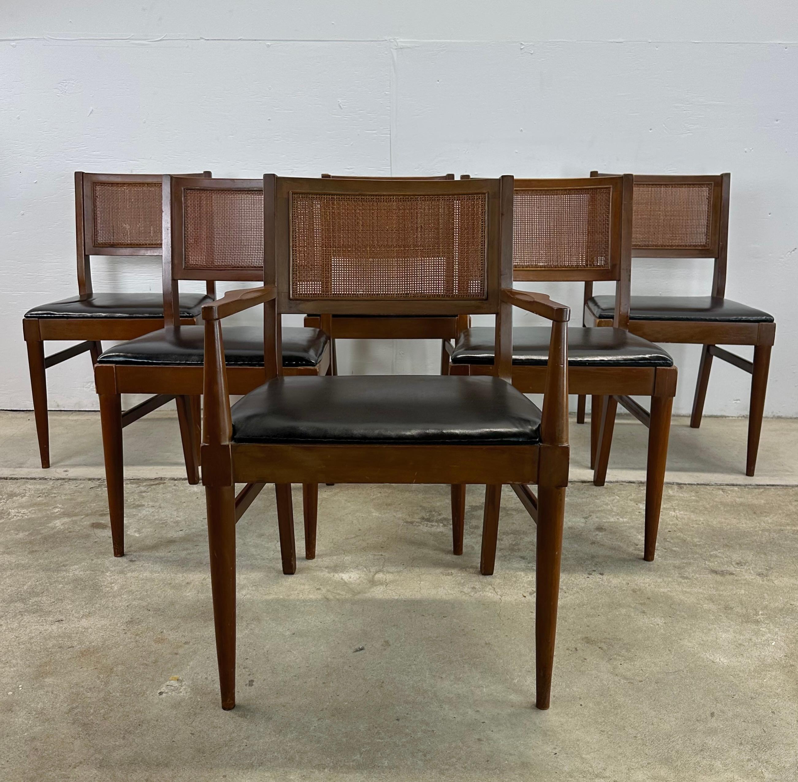 Get ready to bring a touch of classic charm into your home with this fantastic set of Mid-Century Caned Back Walnut Dining Chairs – a cozy set of six that truly captures the heart of mid-century design. Inspired by design greats like Pierre